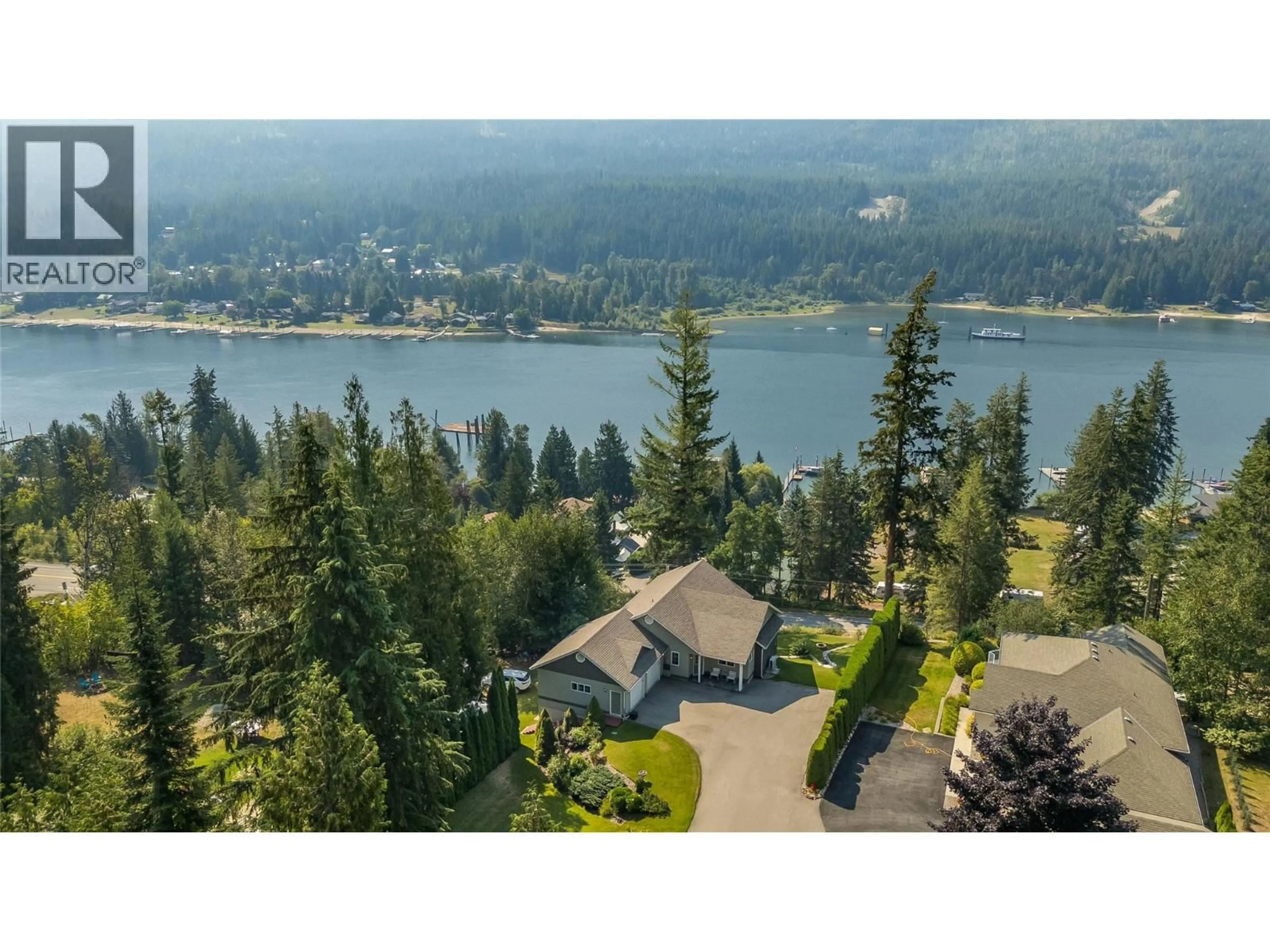 A pic from outside/outdoor area/front of a property/back of a property/a pic from drone, water/lake/river/ocean view for 408 BALFOUR HEIGHTS ROAD, Balfour British Columbia V0G1C0