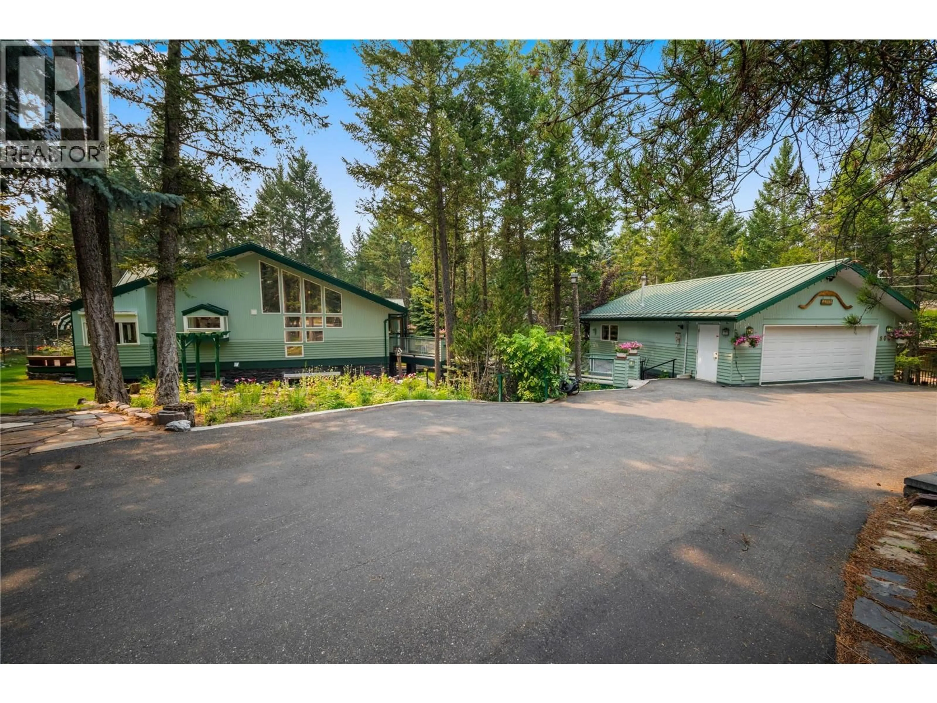 A pic from outside/outdoor area/front of a property/back of a property/a pic from drone, forest/trees view for 8038 MCINTOSH LOOP ROAD, Dry Gulch British Columbia V0A1M0