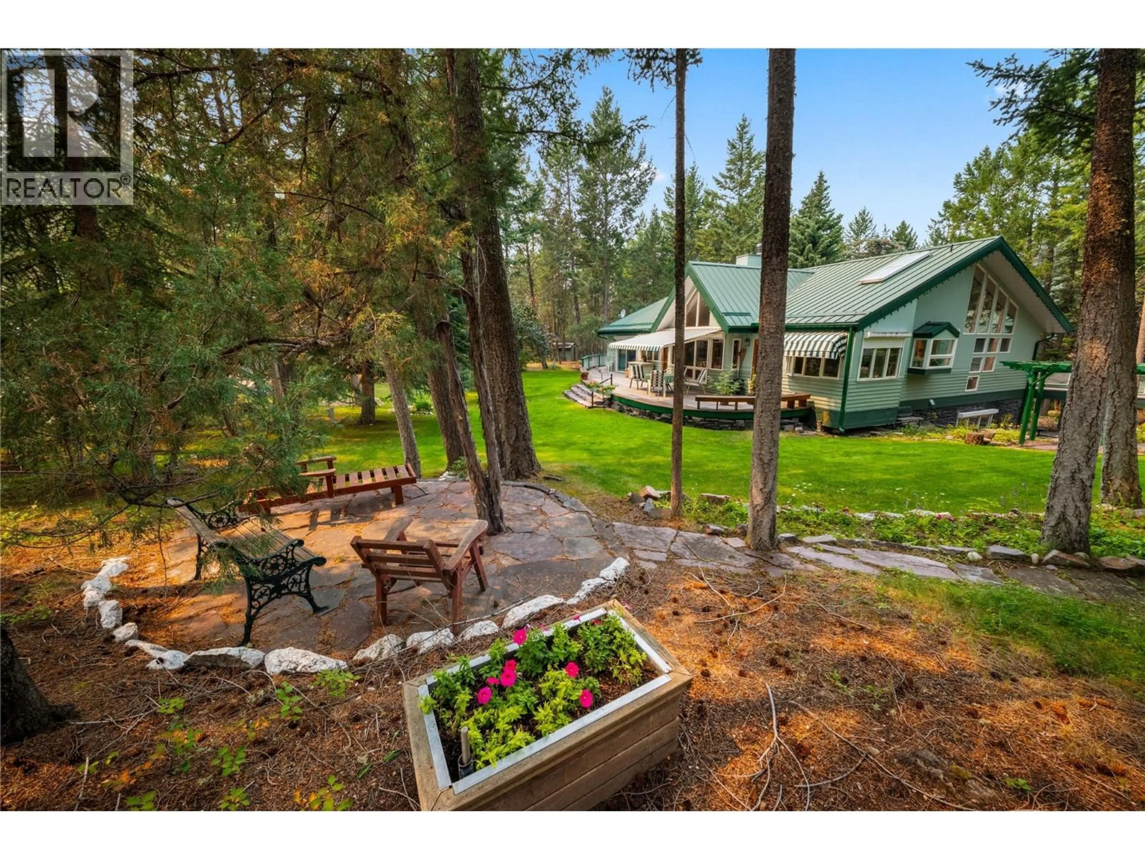A pic from outside/outdoor area/front of a property/back of a property/a pic from drone, forest/trees view for 8038 MCINTOSH LOOP ROAD, Dry Gulch British Columbia V0A1M0