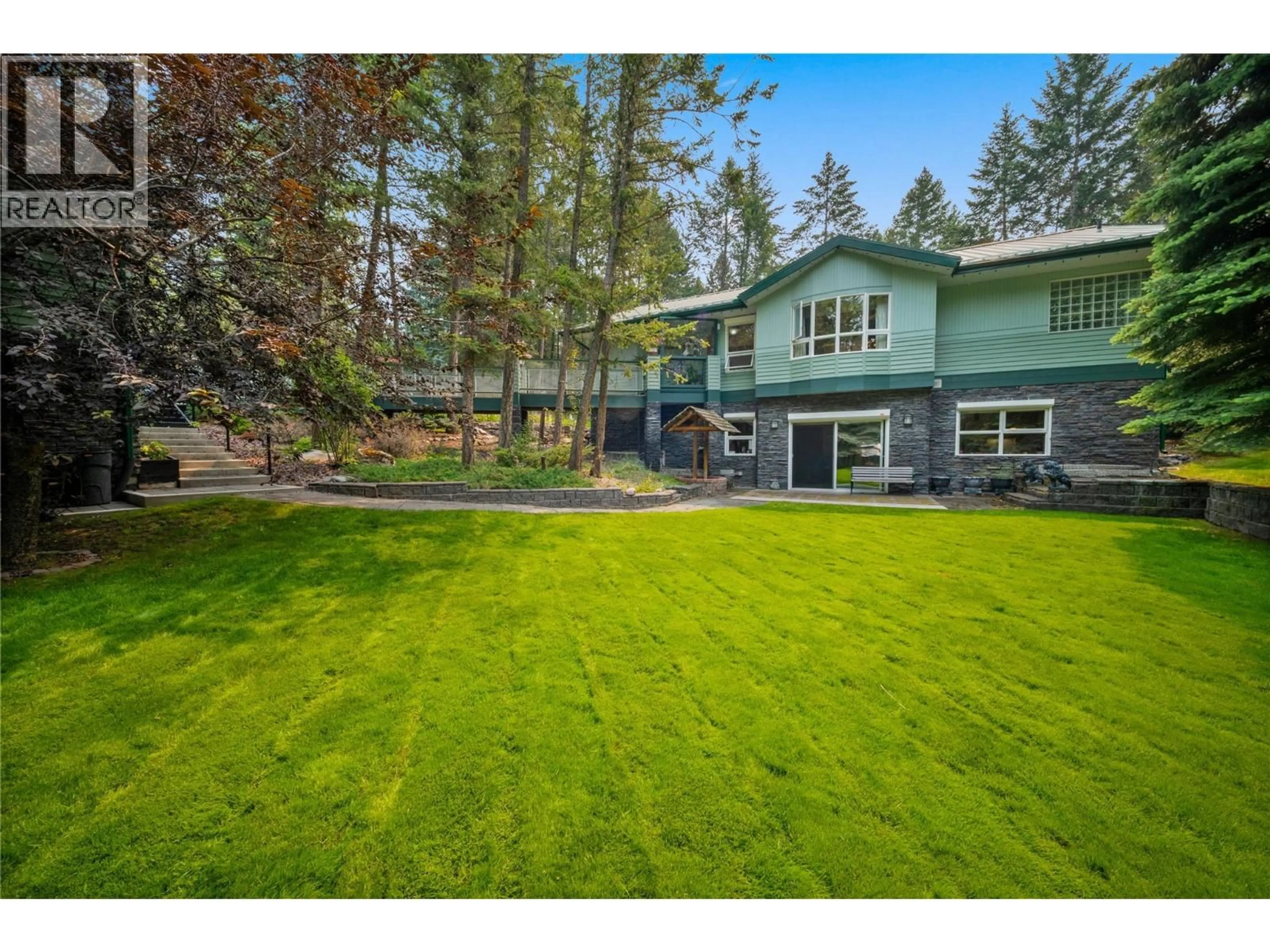 A pic from outside/outdoor area/front of a property/back of a property/a pic from drone, unknown for 8038 MCINTOSH LOOP ROAD, Dry Gulch British Columbia V0A1M0
