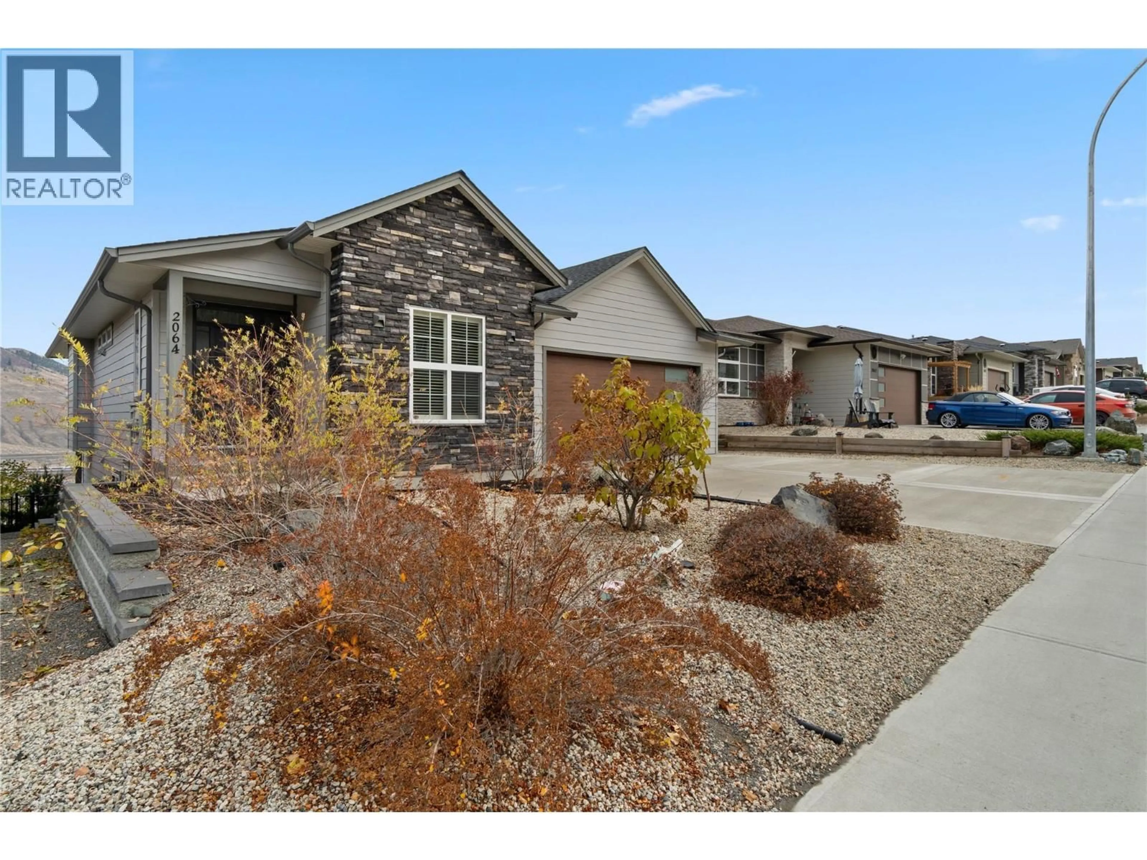 Home with brick exterior material, street for 2064 SADDLEBACK DRIVE, Kamloops British Columbia V2B0H2