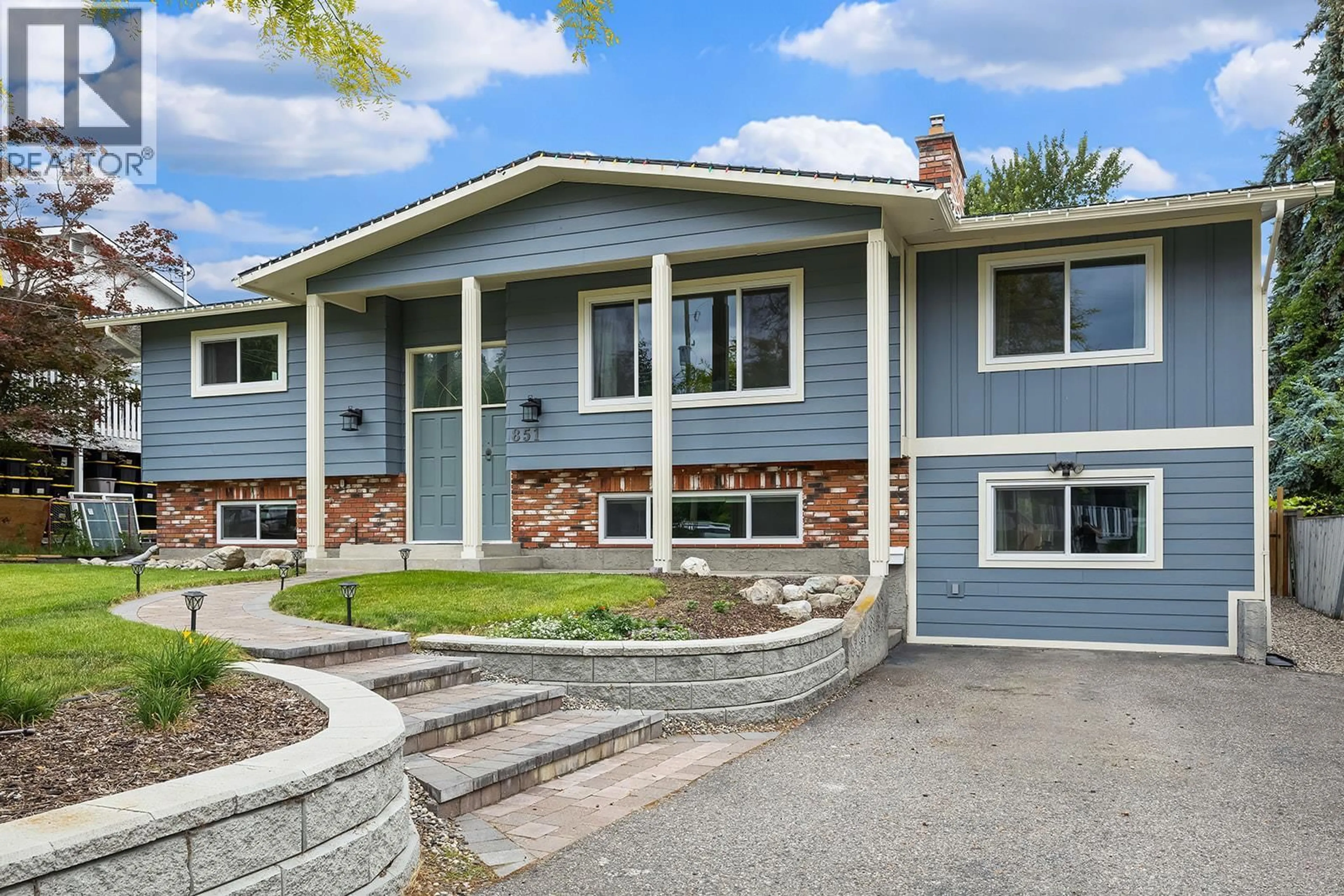 Home with vinyl exterior material, street for 851 HAMMER AVENUE, Kelowna British Columbia V1W2B7