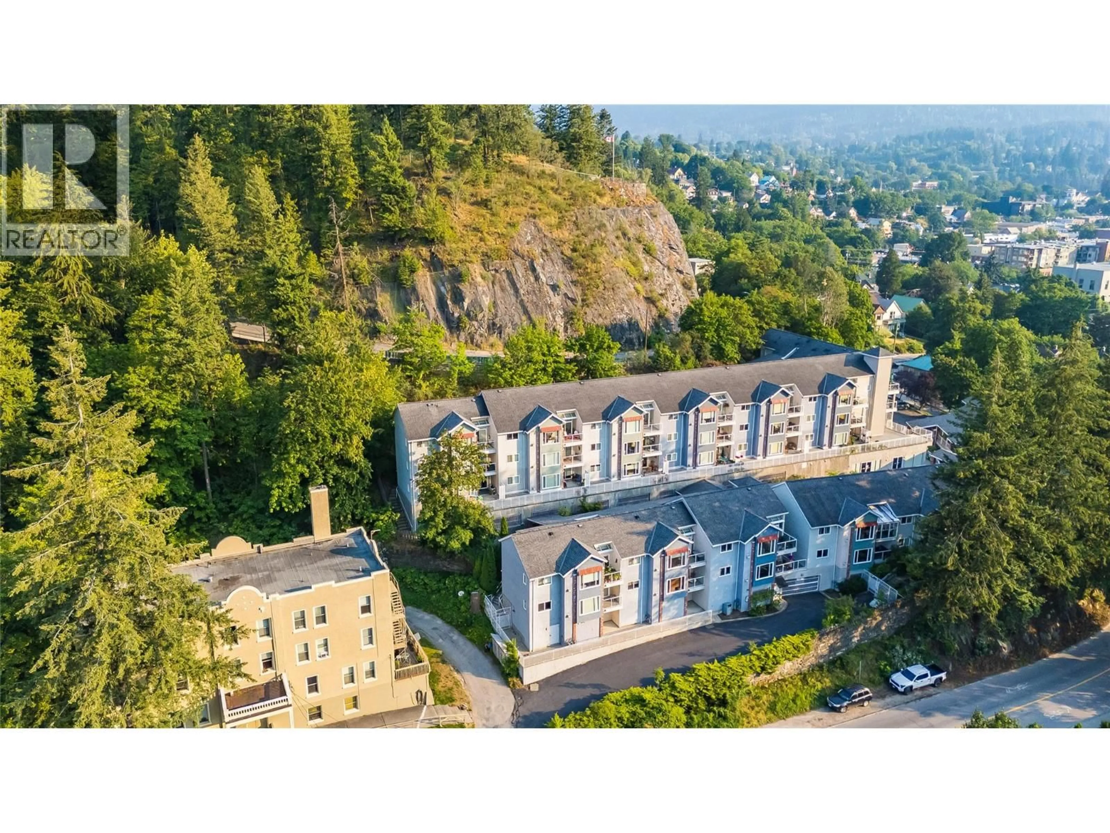 A pic from outside/outdoor area/front of a property/back of a property/a pic from drone, mountain view for 307 - 38 HIGH STREET, Nelson British Columbia V1L6E7
