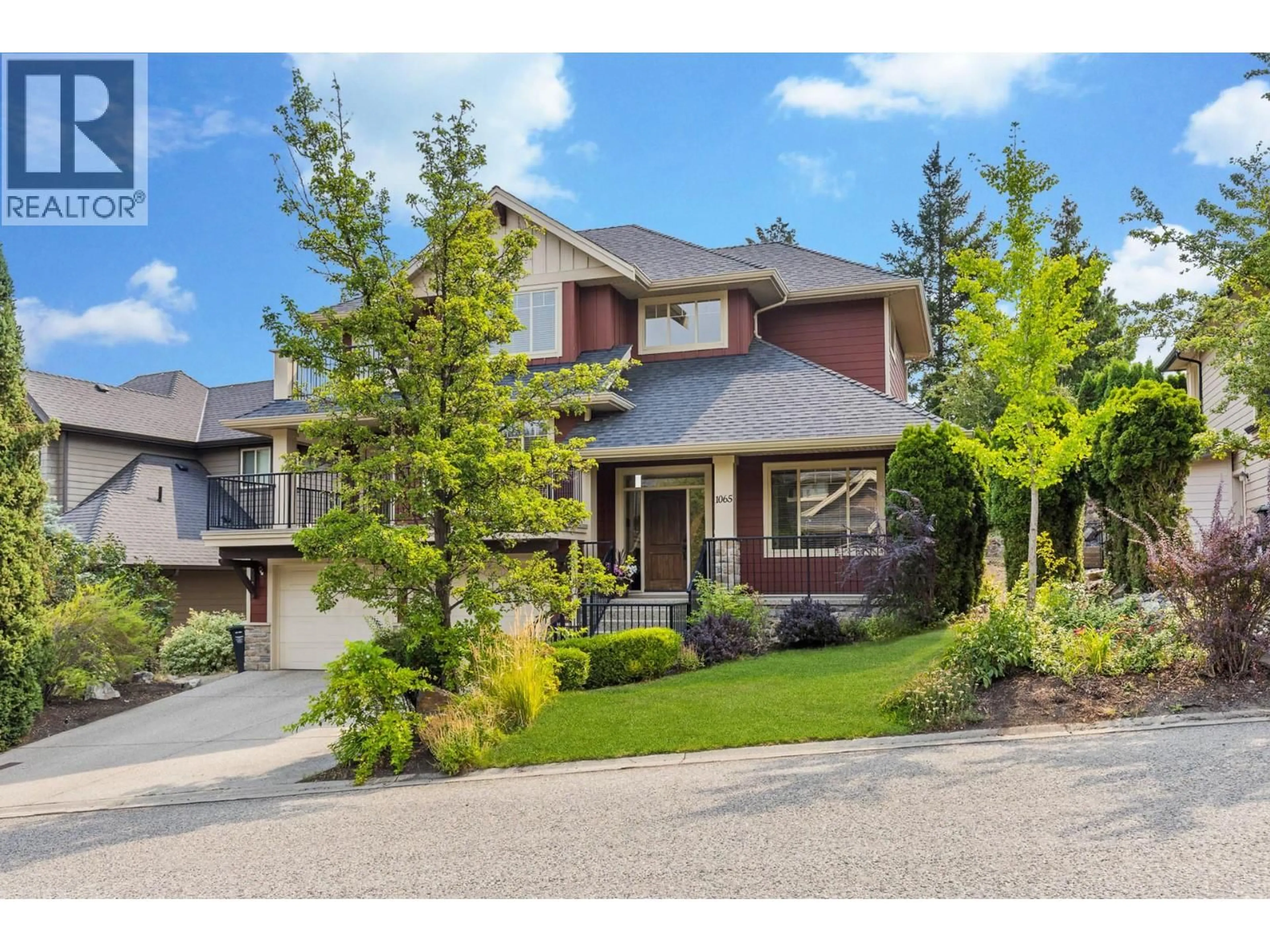 Home with brick exterior material, street for 1065 LONG RIDGE DRIVE, Kelowna British Columbia V1V2S1