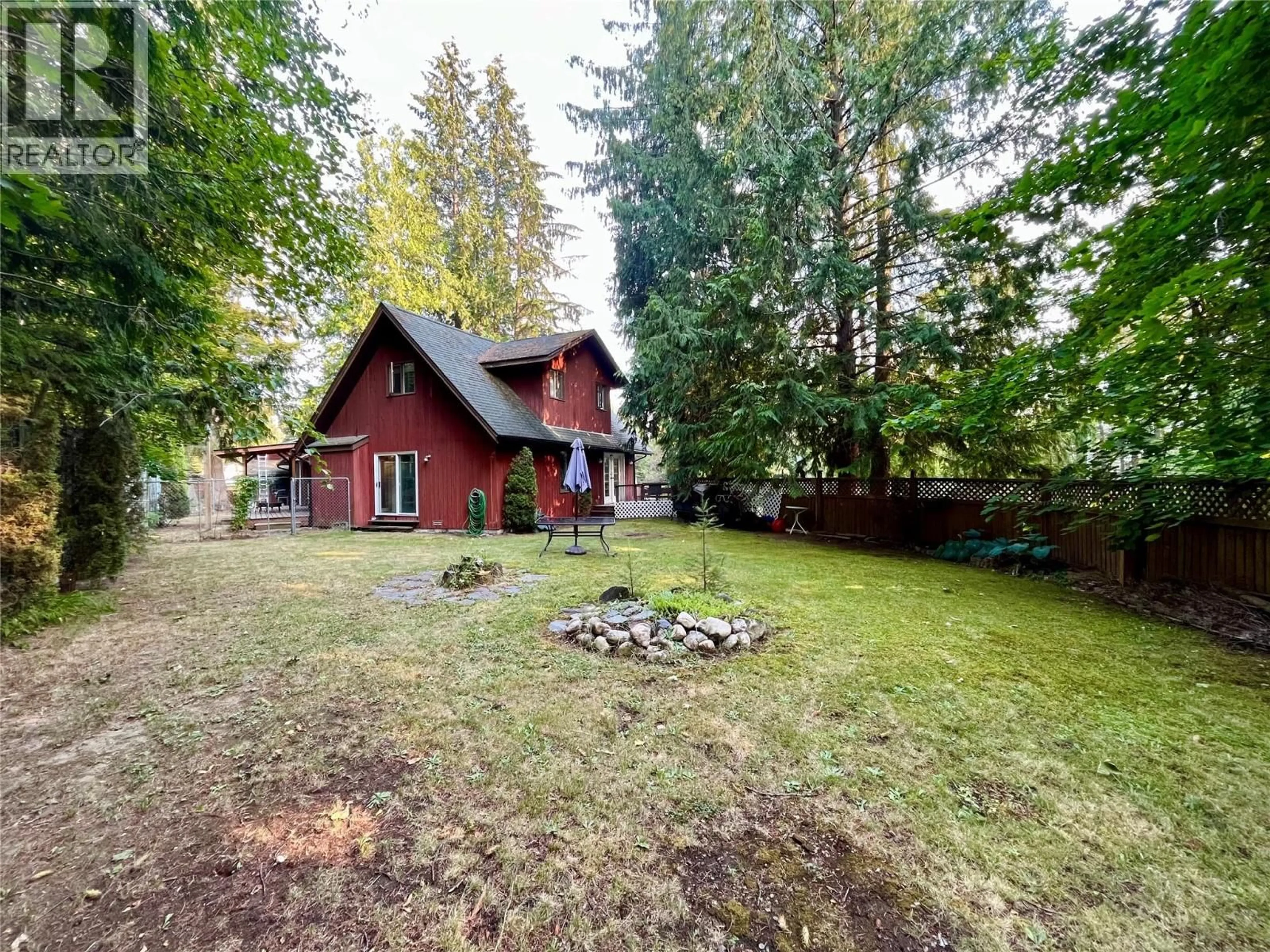 A pic from outside/outdoor area/front of a property/back of a property/a pic from drone, forest/trees view for 225 6TH STREET, Nakusp British Columbia V0G1R0