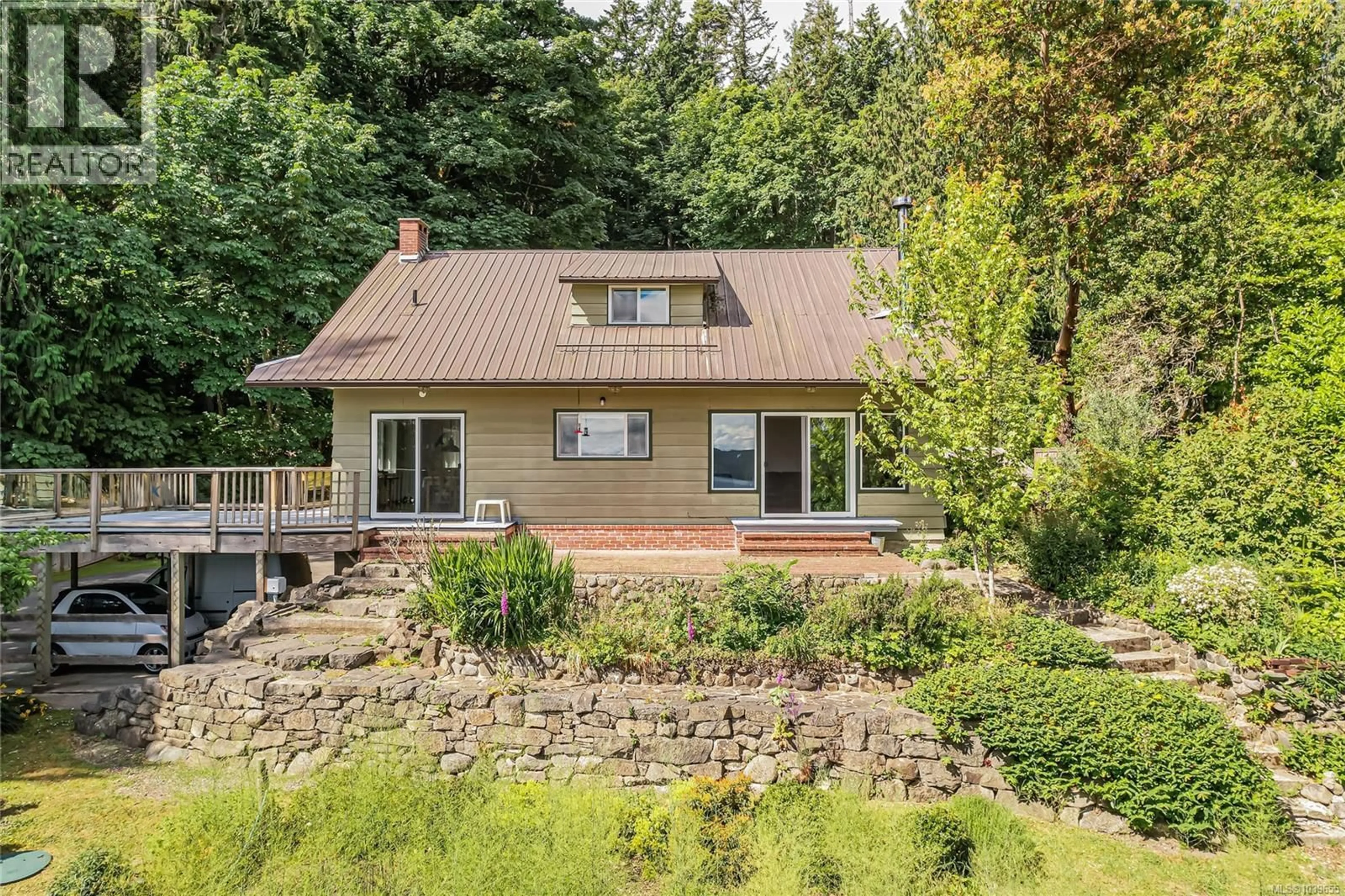 A pic from outside/outdoor area/front of a property/back of a property/a pic from drone, unknown for 670 WALKERS HOOK ROAD, Salt Spring British Columbia V8K1N6