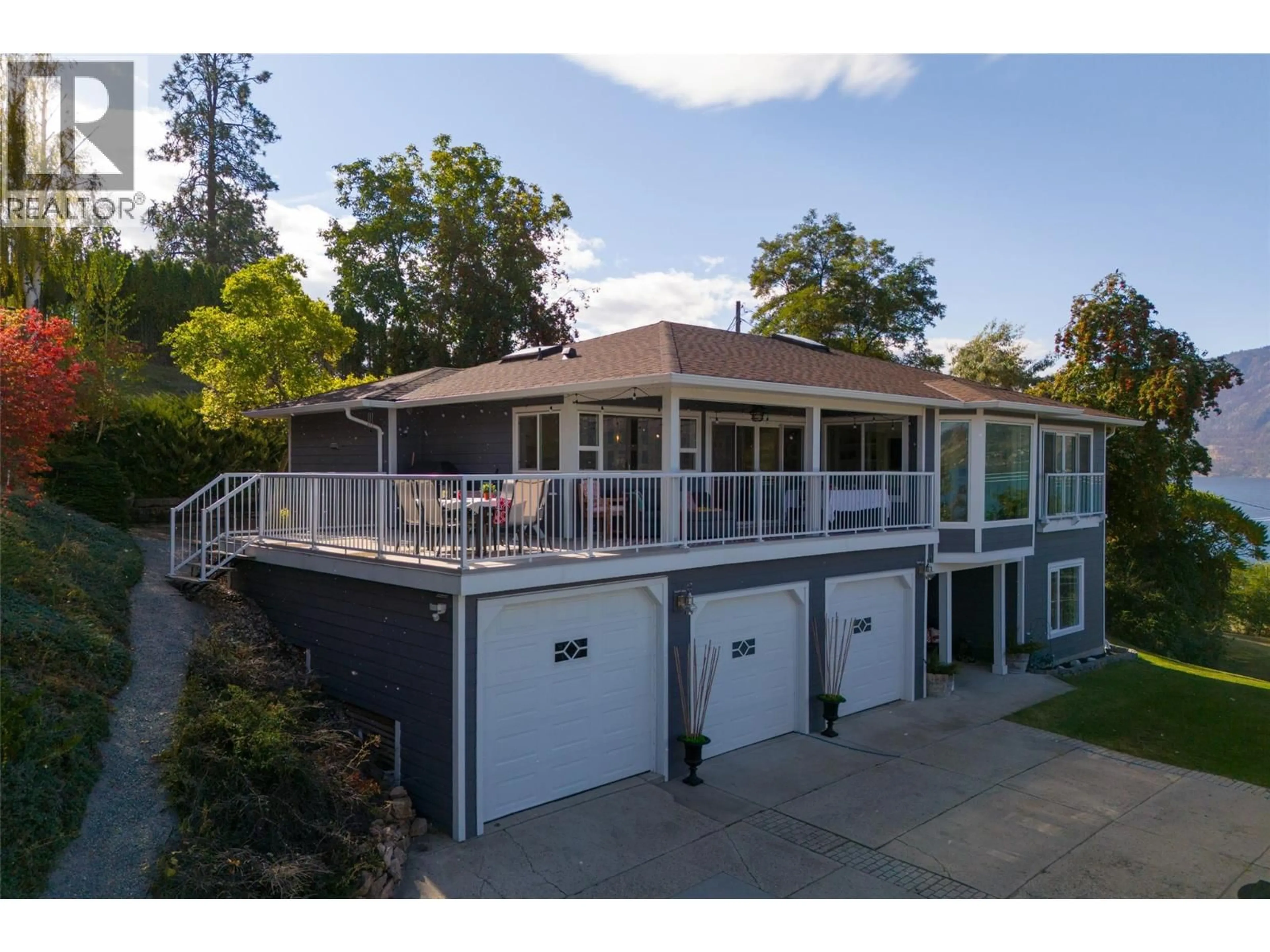 A pic from outside/outdoor area/front of a property/back of a property/a pic from drone, water/lake/river/ocean view for 11935 OKANAGAN CENTRE ROAD WEST, Lake Country British Columbia V4V2H5