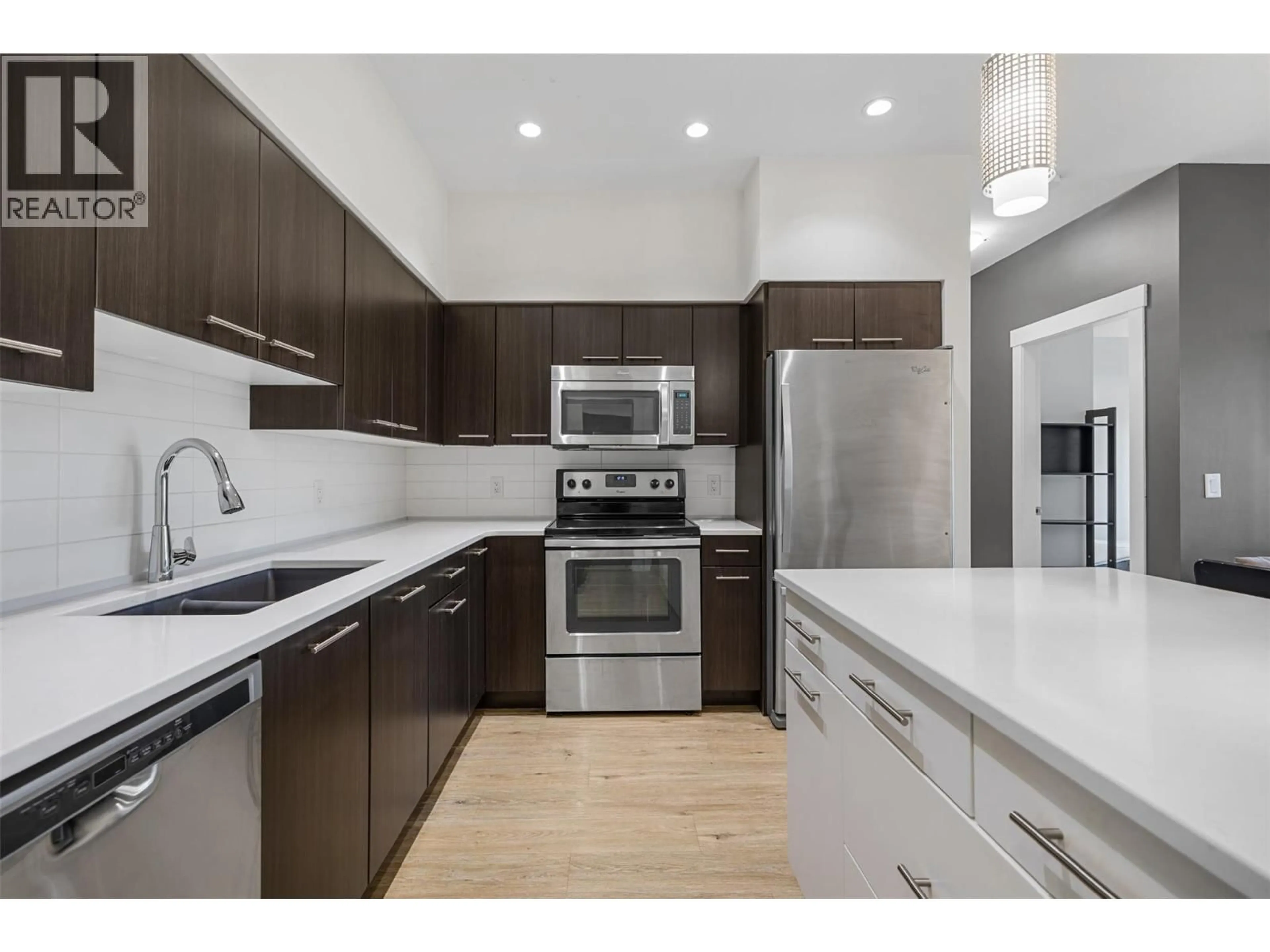 Open concept kitchen, unknown for 104 - 985 ACADEMY WAY, Kelowna British Columbia V1V3C8