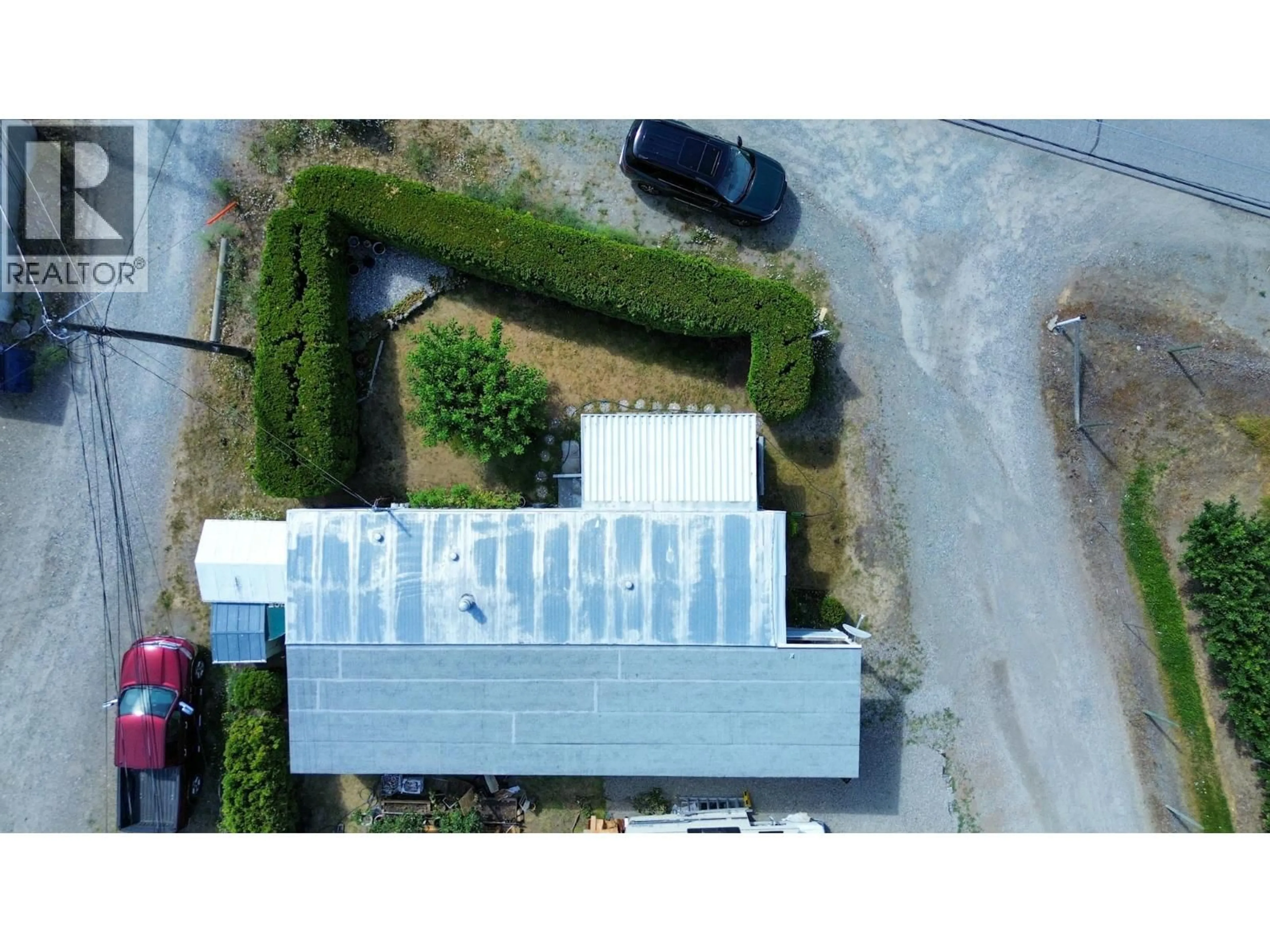 A pic from outside/outdoor area/front of a property/back of a property/a pic from drone, building for 1A - 9904 74TH AVENUE, Osoyoos British Columbia V0H1V5