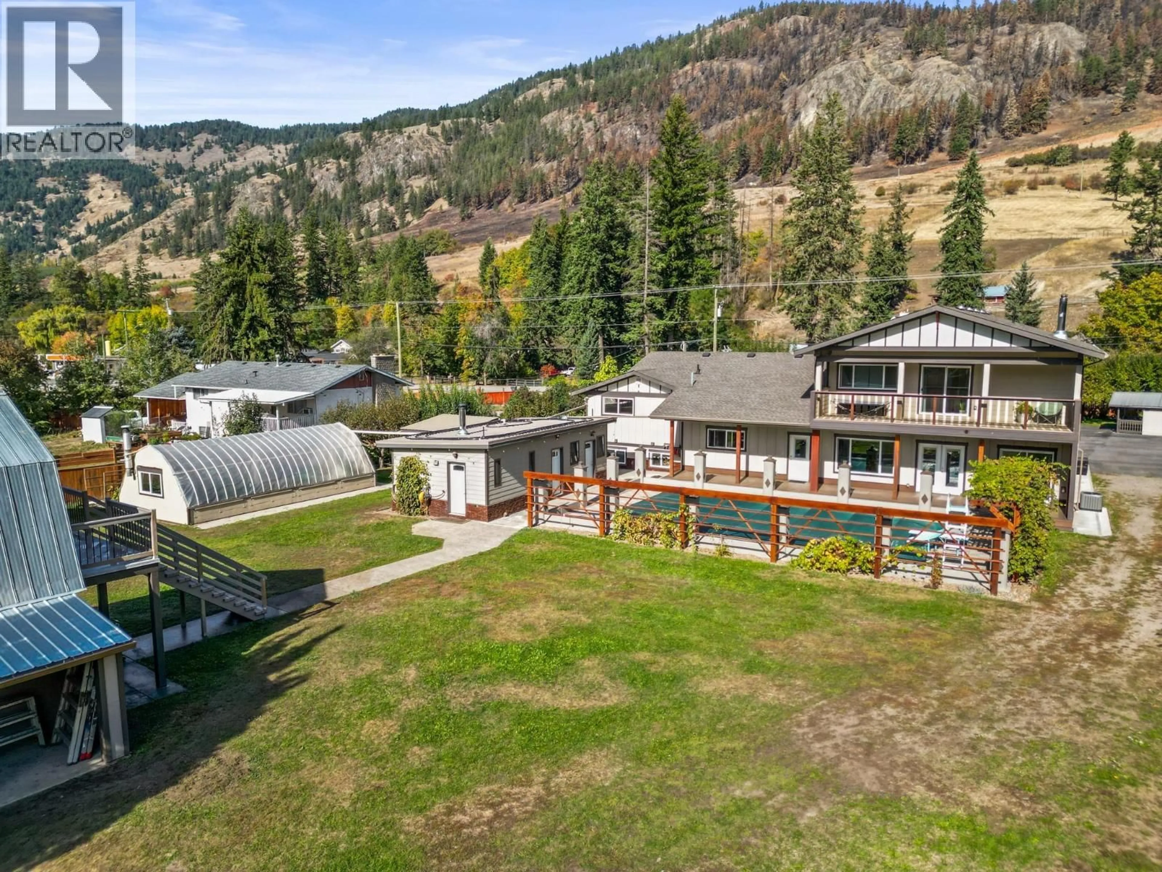 A pic from outside/outdoor area/front of a property/back of a property/a pic from drone, mountain view for 5936 HIGHWAY 6 OTHER, Coldstream British Columbia V1B1C8