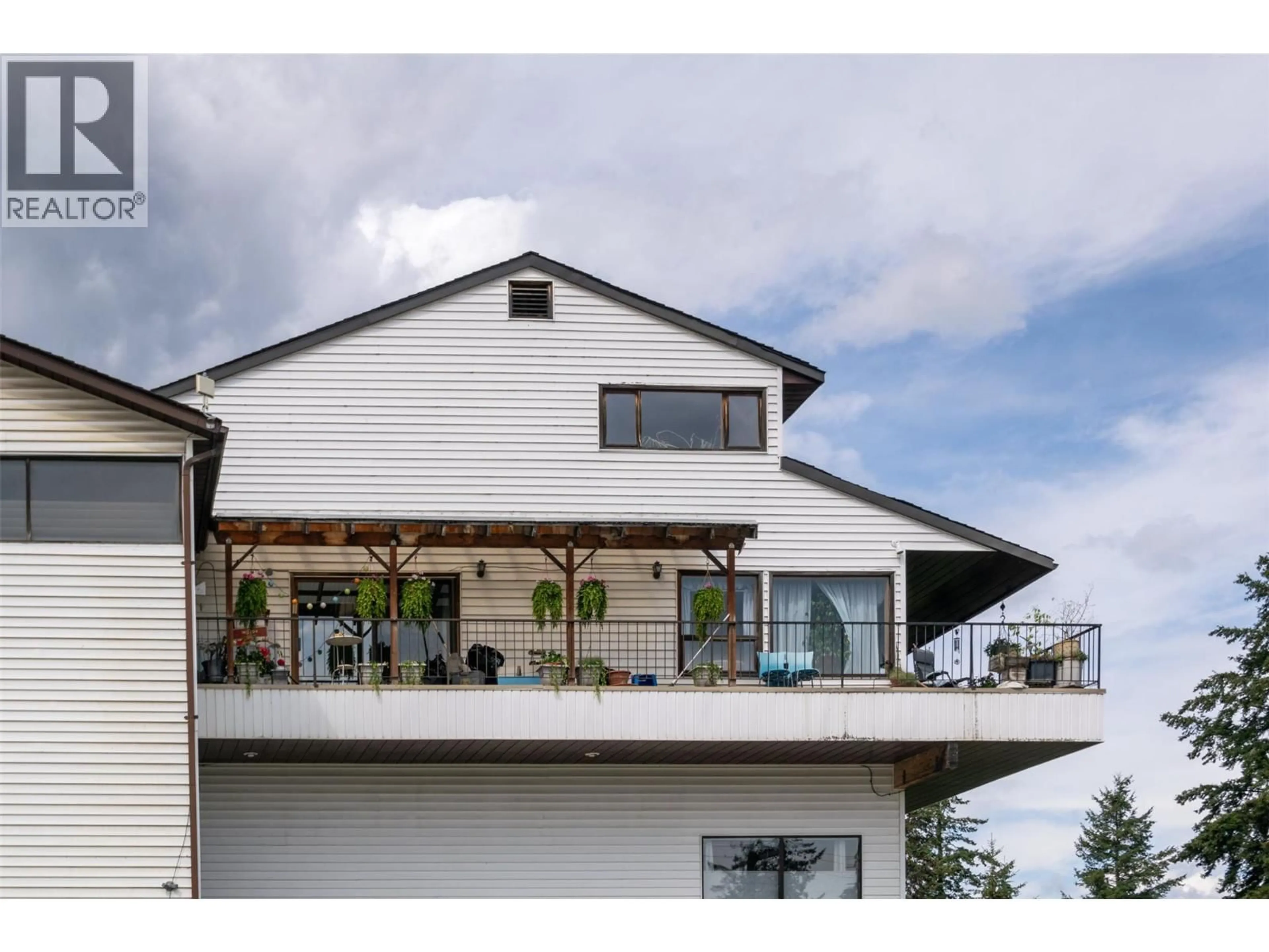 Home with vinyl exterior material, mountain view for 1 - 1261 TRANS CANADA HIGHWAY, Sorrento British Columbia V0E2W0