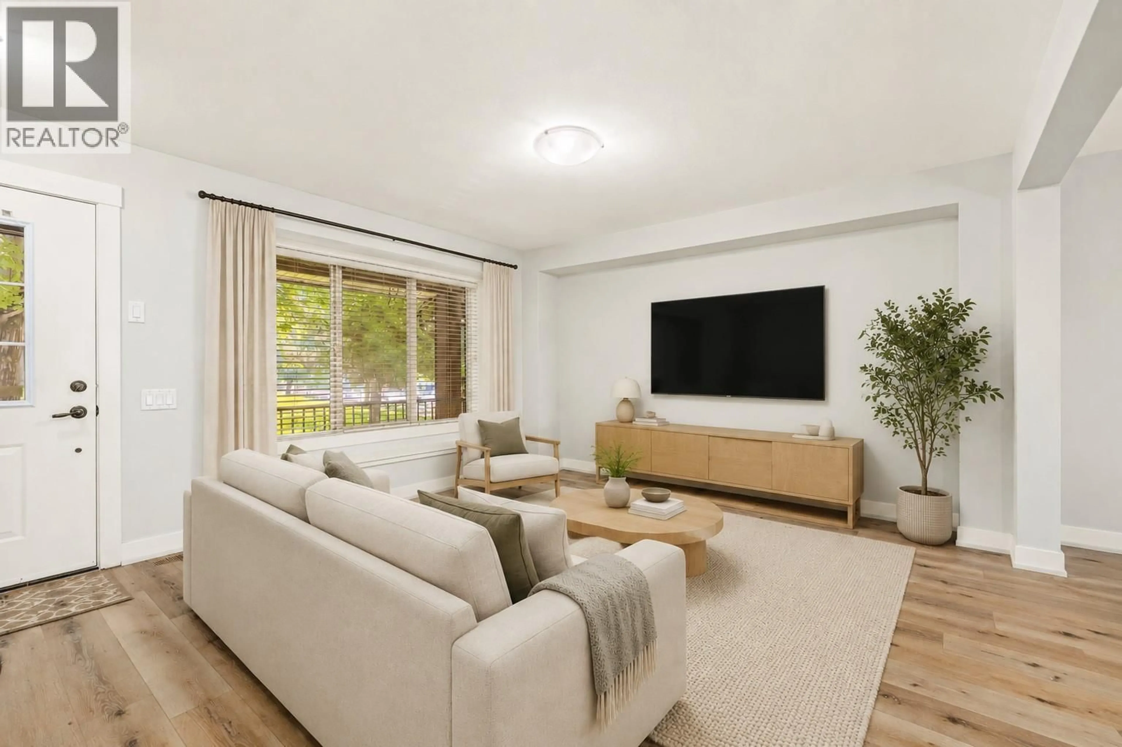Living room with furniture, unknown for 105 - 1651 LYNRICK ROAD, Kelowna British Columbia V1P1E8