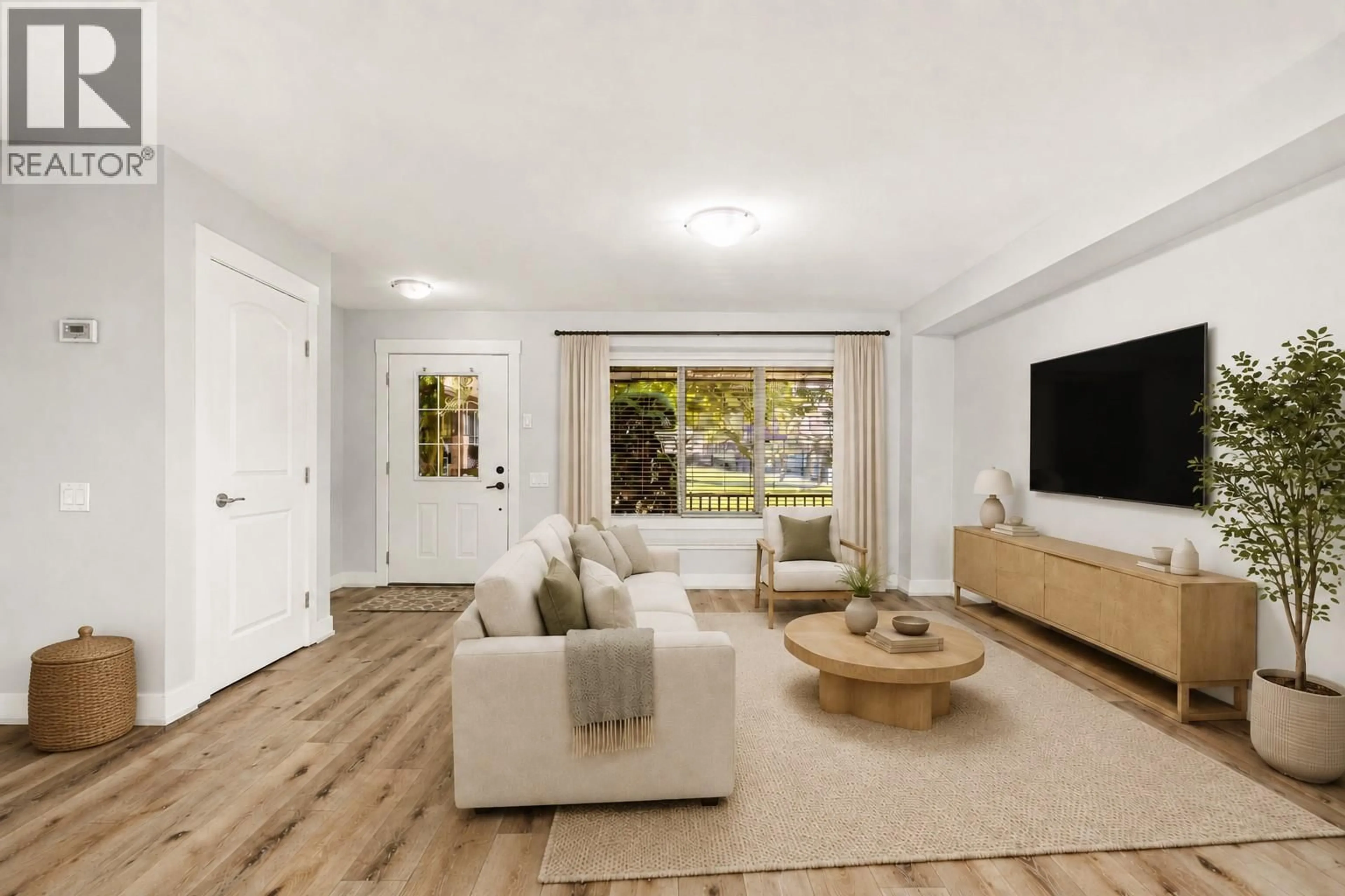 Living room with furniture, unknown for 105 - 1651 LYNRICK ROAD, Kelowna British Columbia V1P1E8