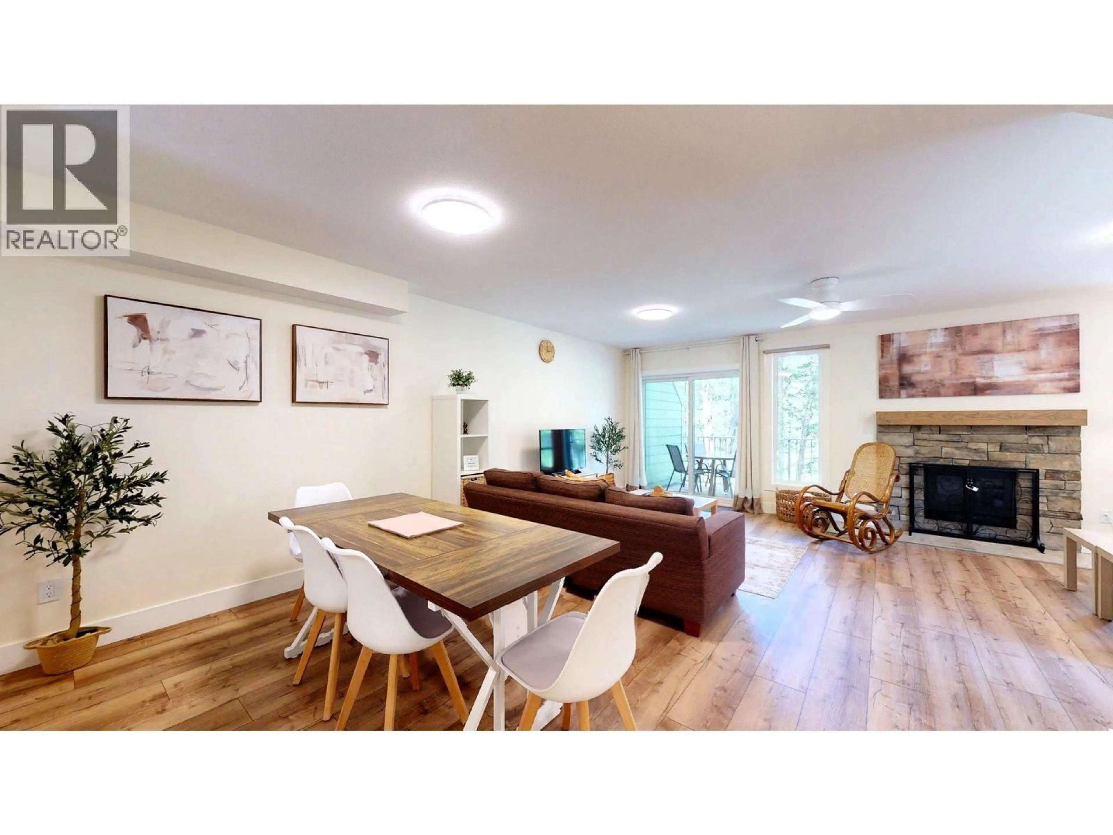 Living room with furniture, wood/laminate floor for 4 - 7977 RADIUM GOLF COURSE ROAD, Radium Hot Springs British Columbia V0A1M0
