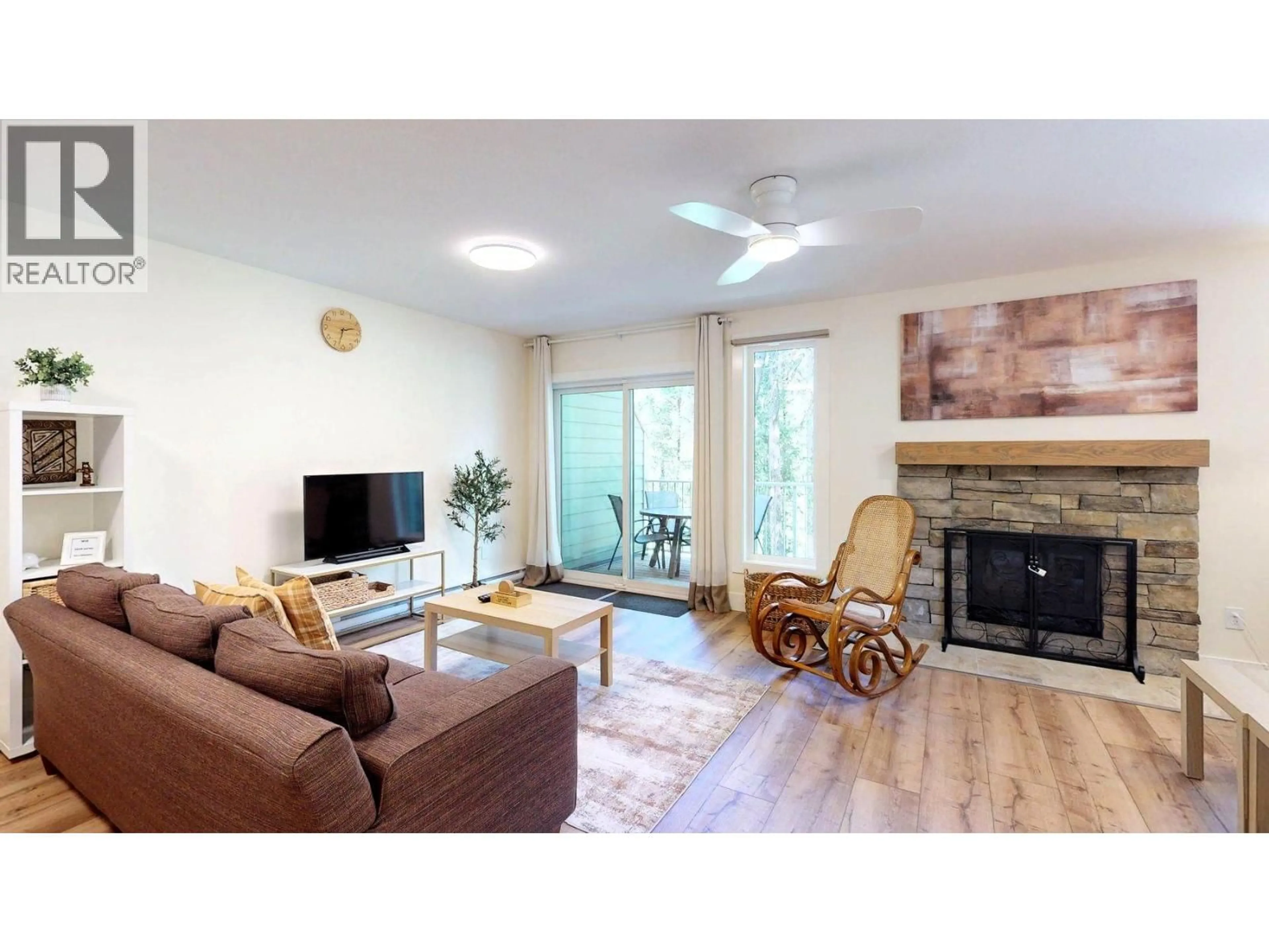 Living room with furniture, wood/laminate floor for 4 - 7977 RADIUM GOLF COURSE ROAD, Radium Hot Springs British Columbia V0A1M0