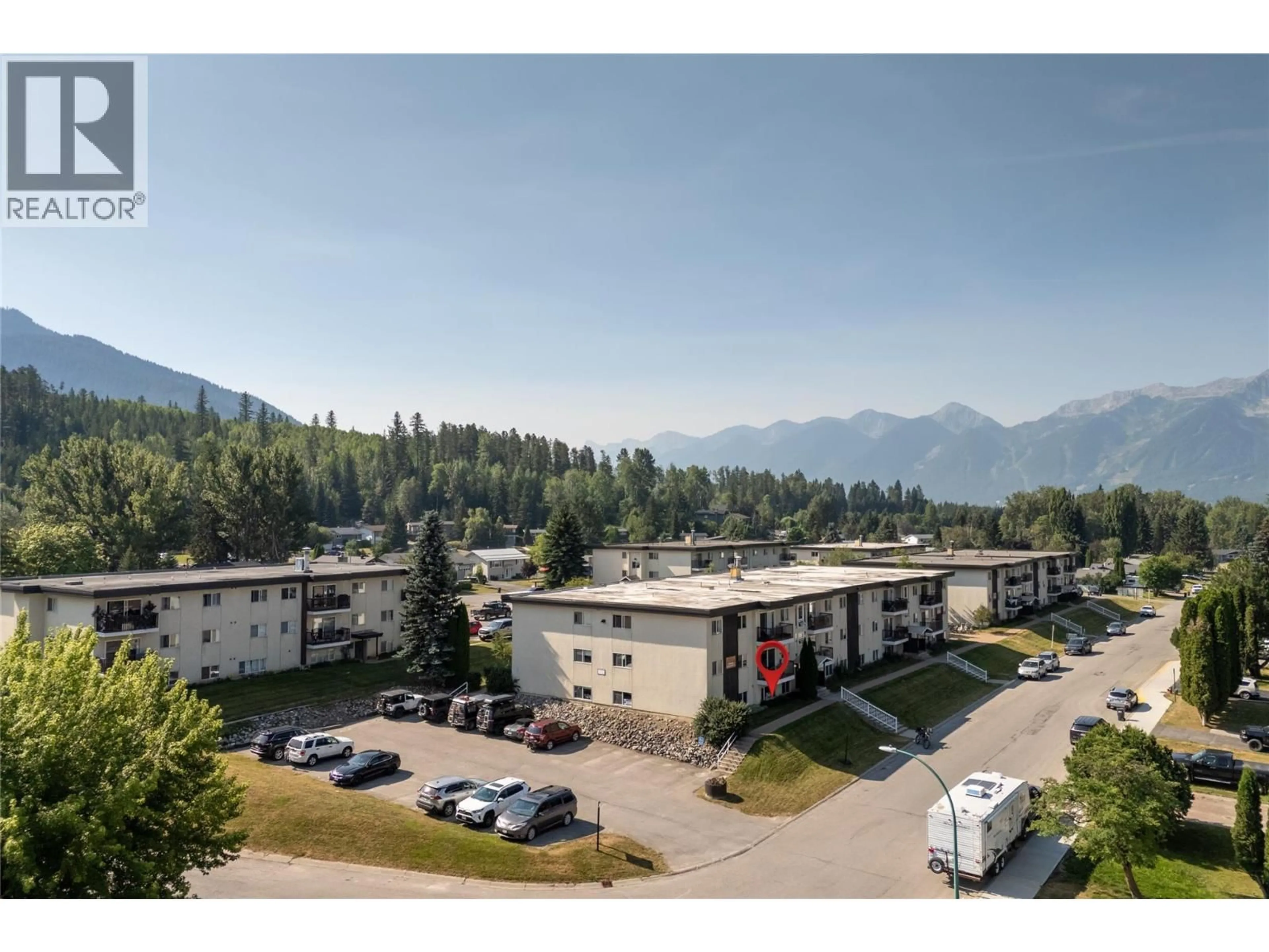 A pic from outside/outdoor area/front of a property/back of a property/a pic from drone, mountain view for 101 - 40 RIDGEMONT AVENUE, Fernie British Columbia V0B1M2