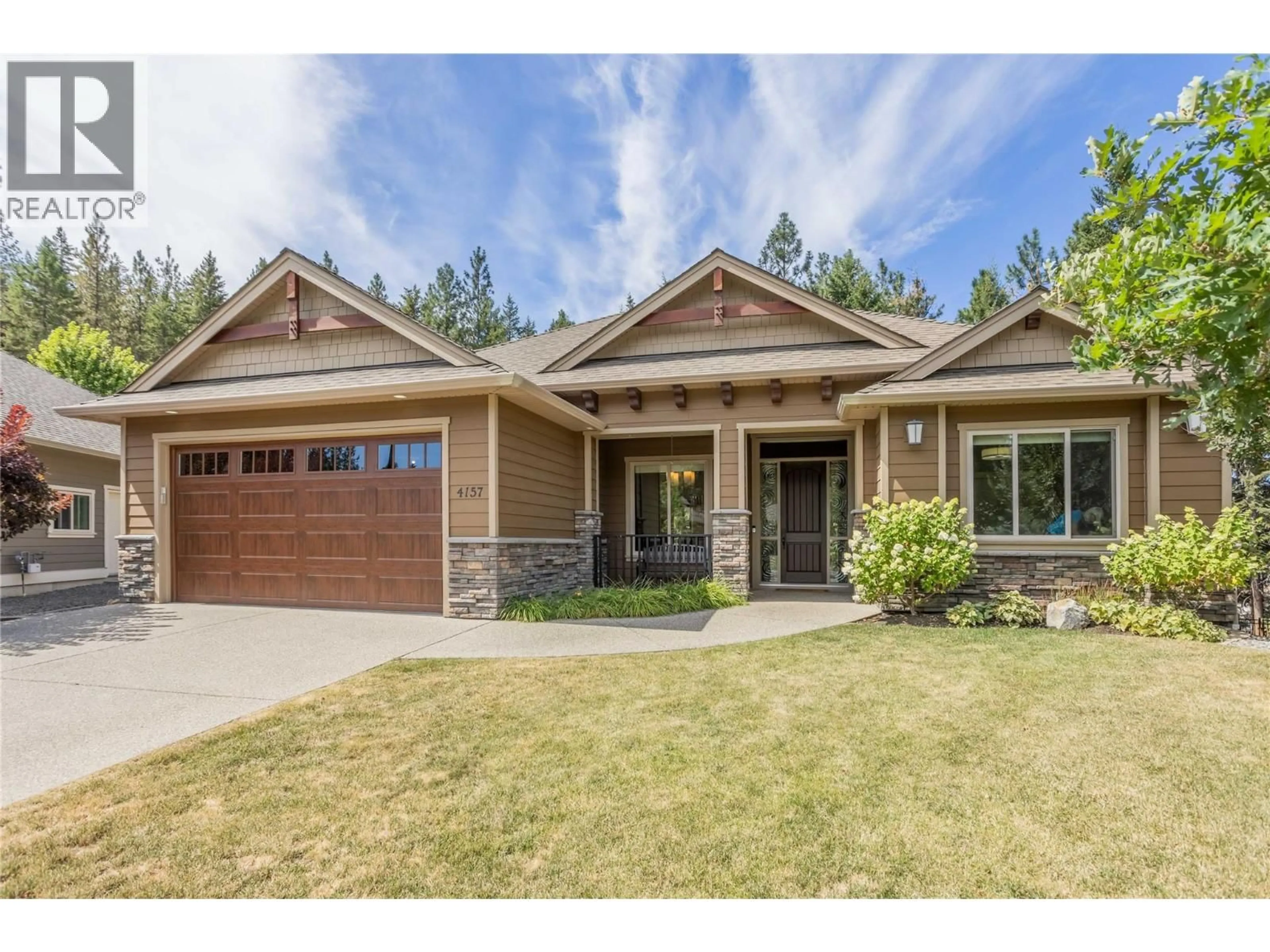 Home with brick exterior material, street for 4157 GALLAGHERS FAIRWAY S OTHER, Kelowna British Columbia V1W5G3