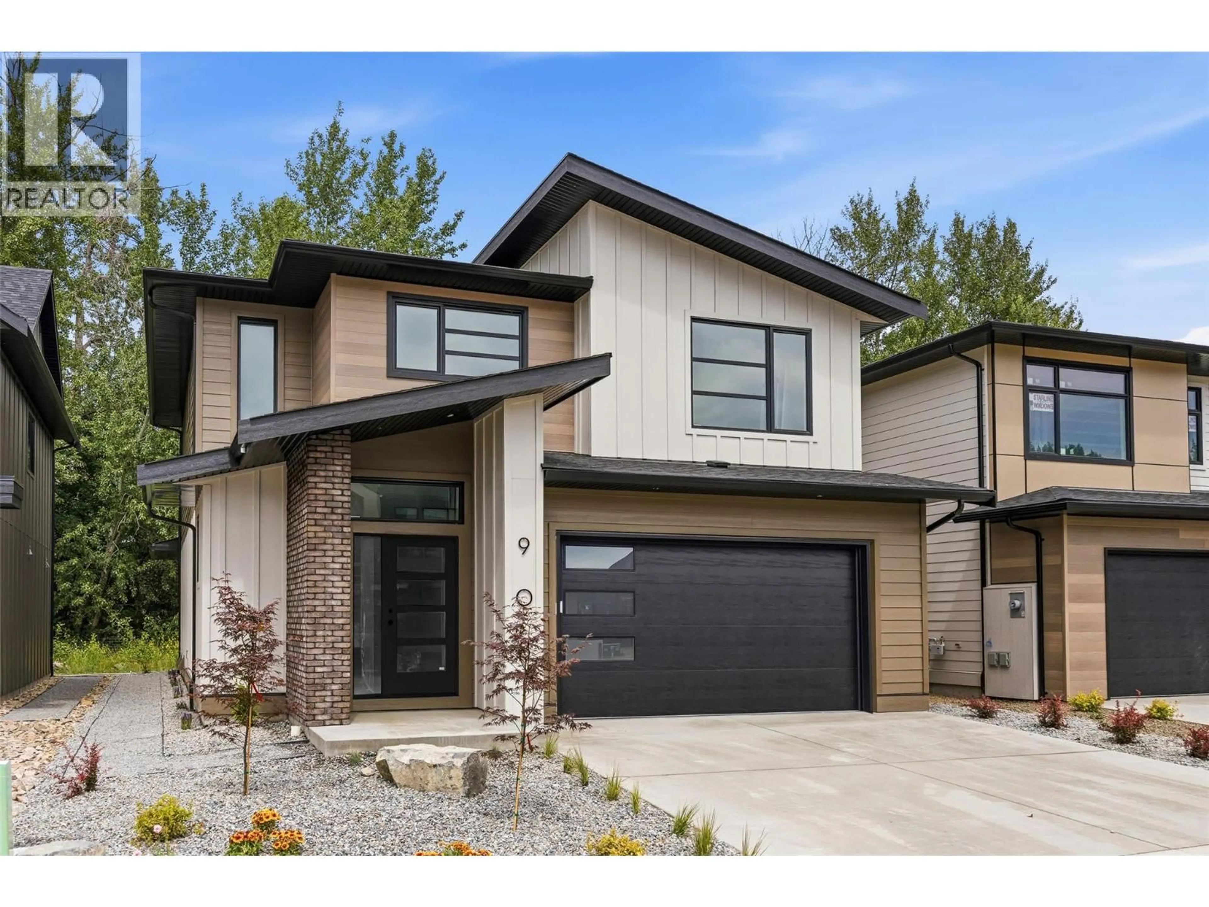 Home with brick exterior material, street for 908 BULL CRESCENT, Kelowna British Columbia V1W4N2