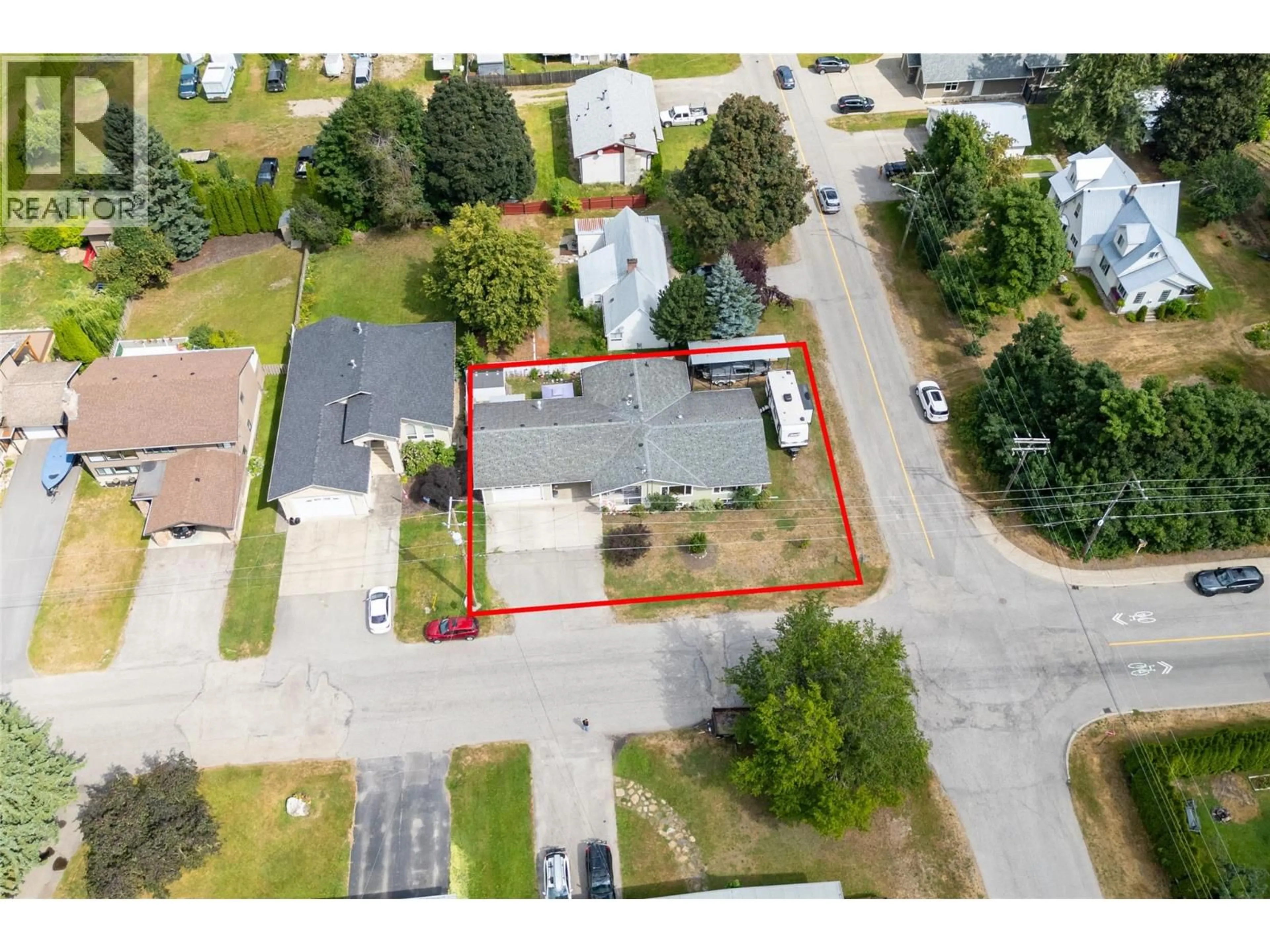 A pic from outside/outdoor area/front of a property/back of a property/a pic from drone, street for 2032 LAFORME BOULEVARD, Revelstoke British Columbia V0E2S0
