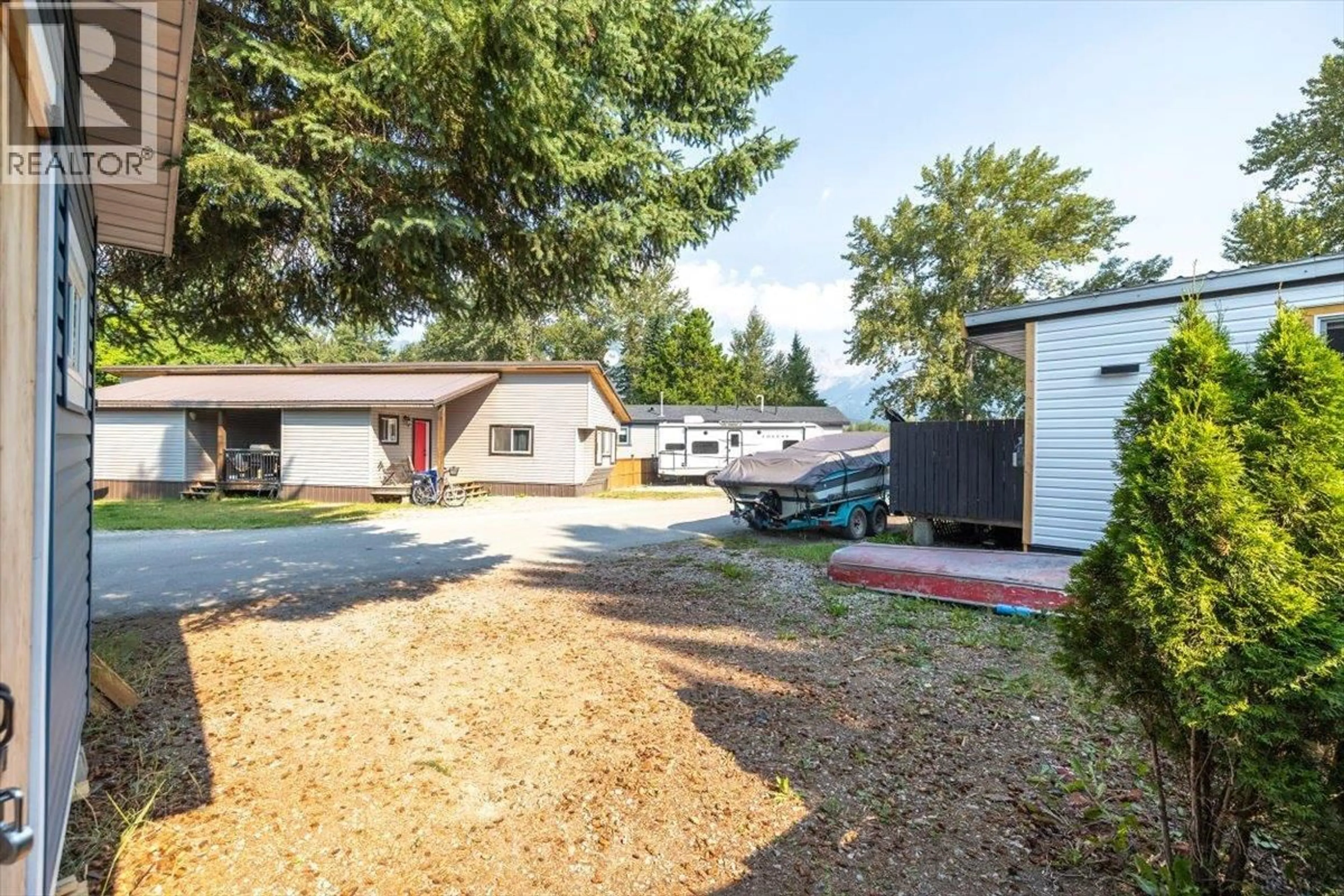 A pic from outside/outdoor area/front of a property/back of a property/a pic from drone, street for E13 - 60 COKATO ROAD, Fernie British Columbia V0B1M4