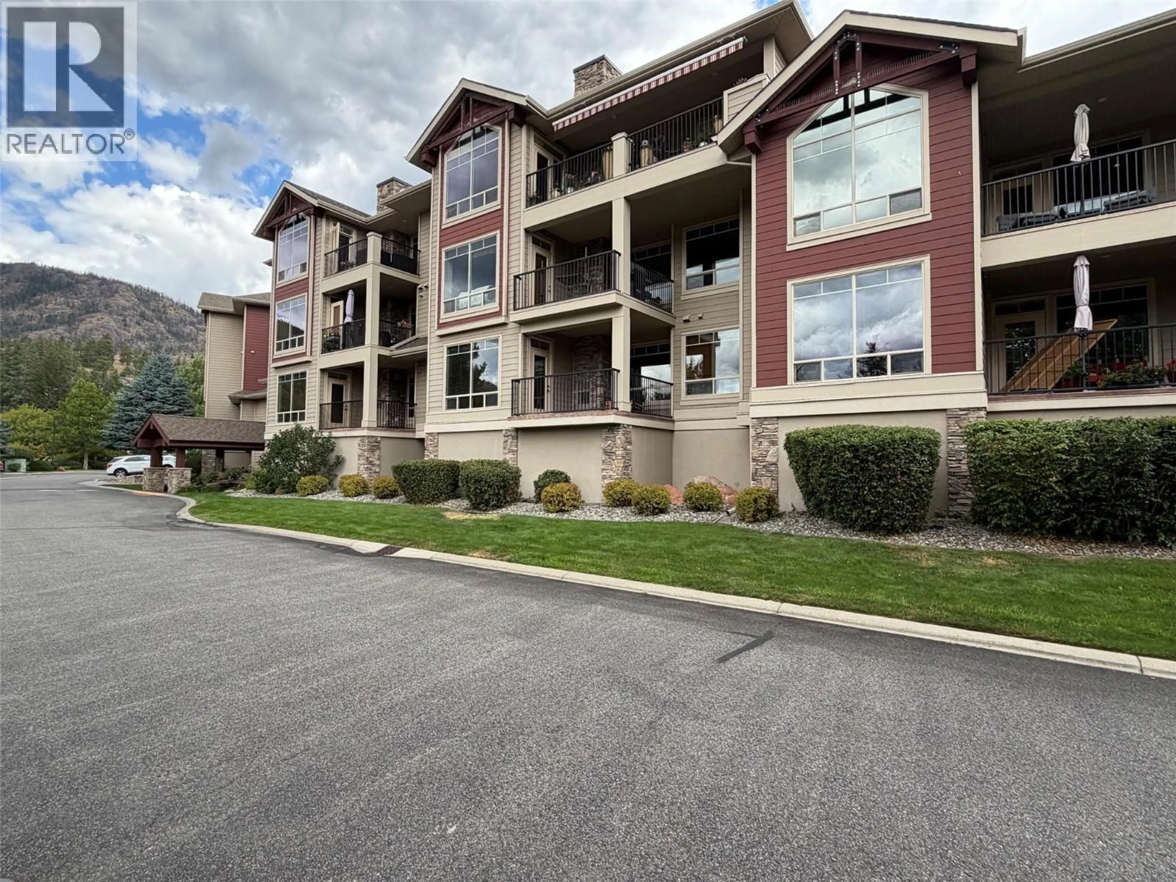 A pic from outside/outdoor area/front of a property/back of a property/a pic from drone, mountain view for 107 - 2770 AUBURN ROAD, West Kelowna British Columbia V4T2C4