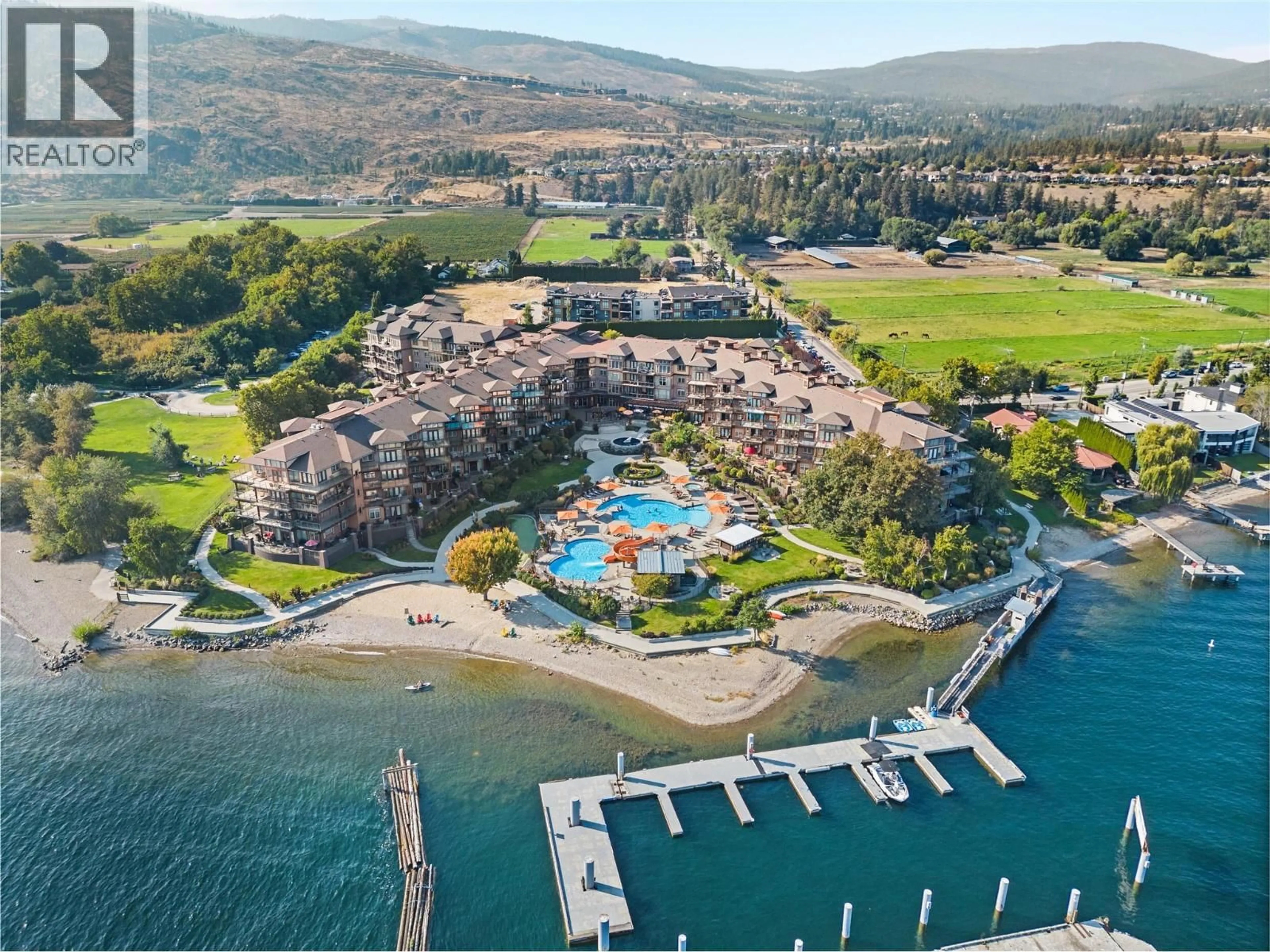 A pic from outside/outdoor area/front of a property/back of a property/a pic from drone, water/lake/river/ocean view for 238 - 4205 GELLATLY ROAD, West Kelowna British Columbia V4T2K2