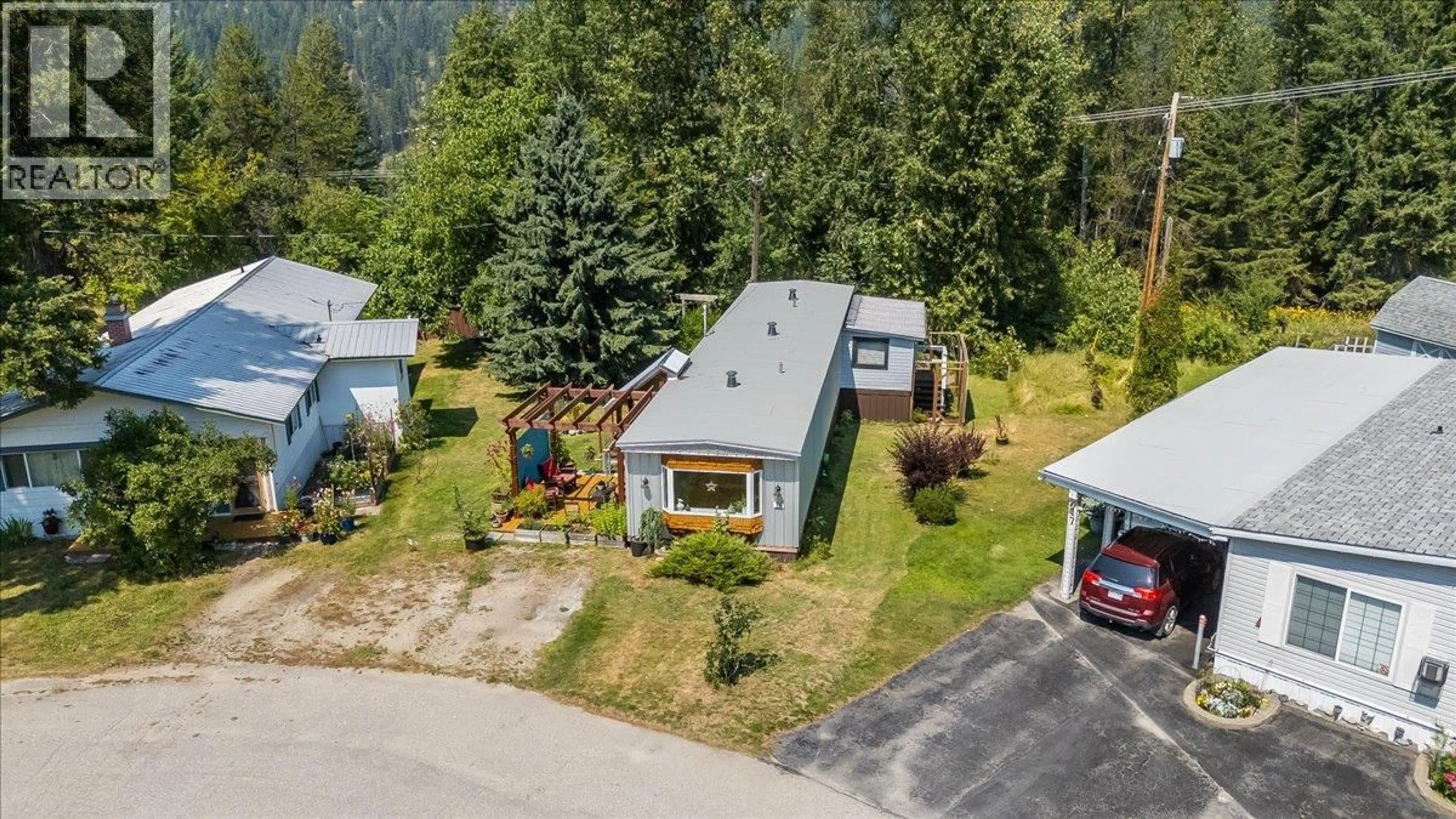 A pic from outside/outdoor area/front of a property/back of a property/a pic from drone, mountain view for 18 - 2917 GEORAMA ROAD, Nelson British Columbia V1L6Y7
