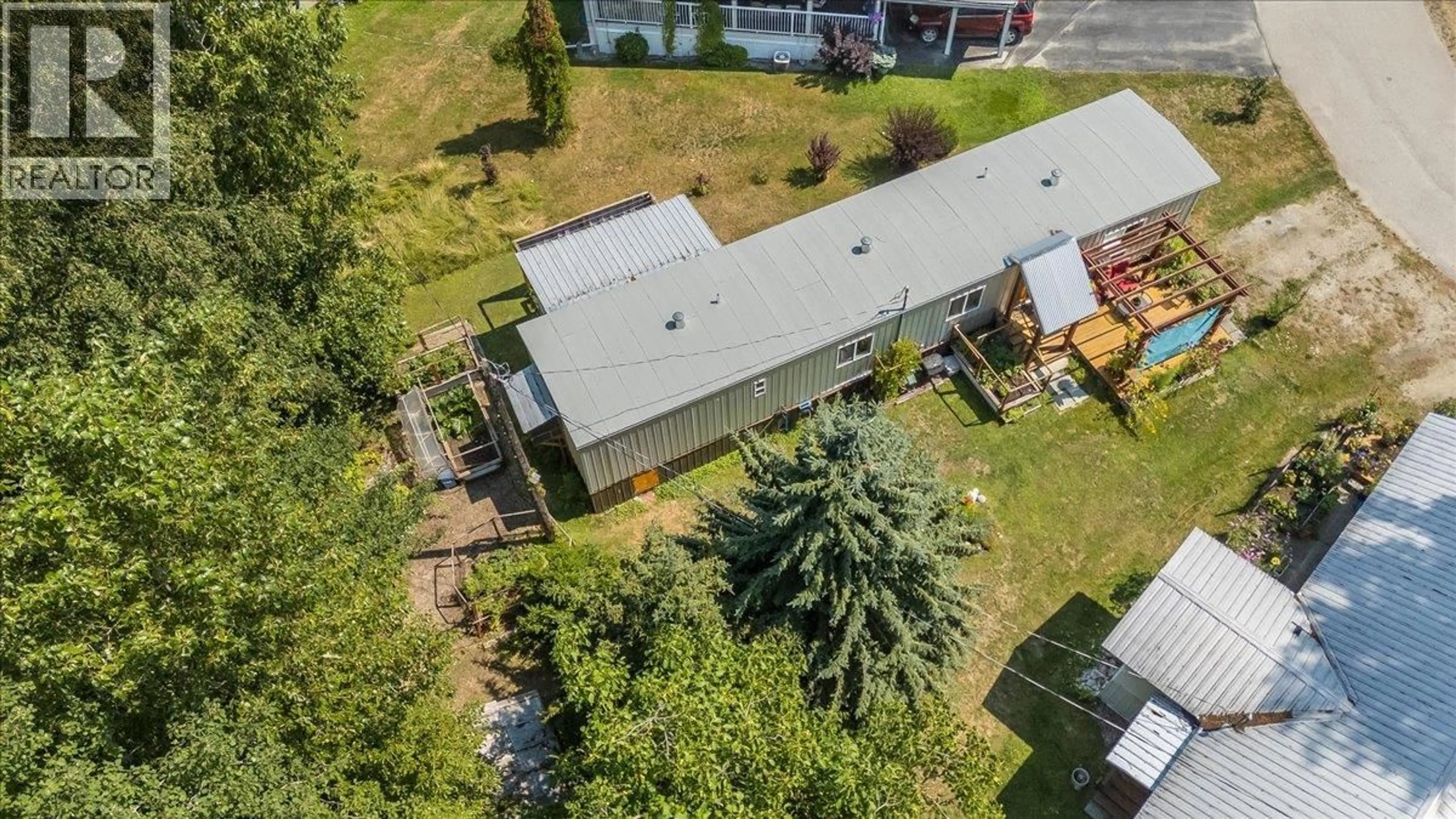 A pic from outside/outdoor area/front of a property/back of a property/a pic from drone, unknown for 18 - 2917 GEORAMA ROAD, Nelson British Columbia V1L6Y7