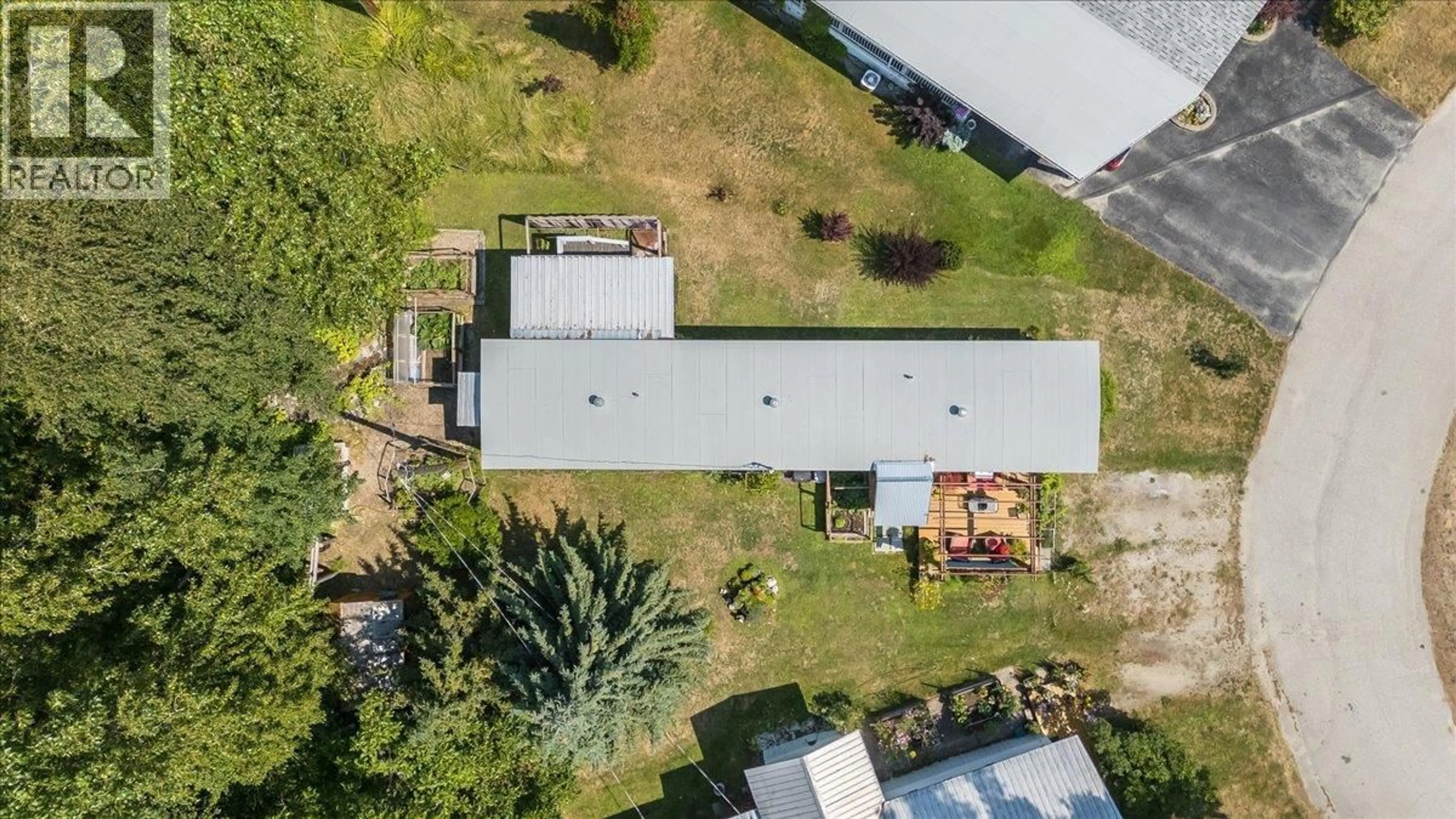 A pic from outside/outdoor area/front of a property/back of a property/a pic from drone, building for 18 - 2917 GEORAMA ROAD, Nelson British Columbia V1L6Y7