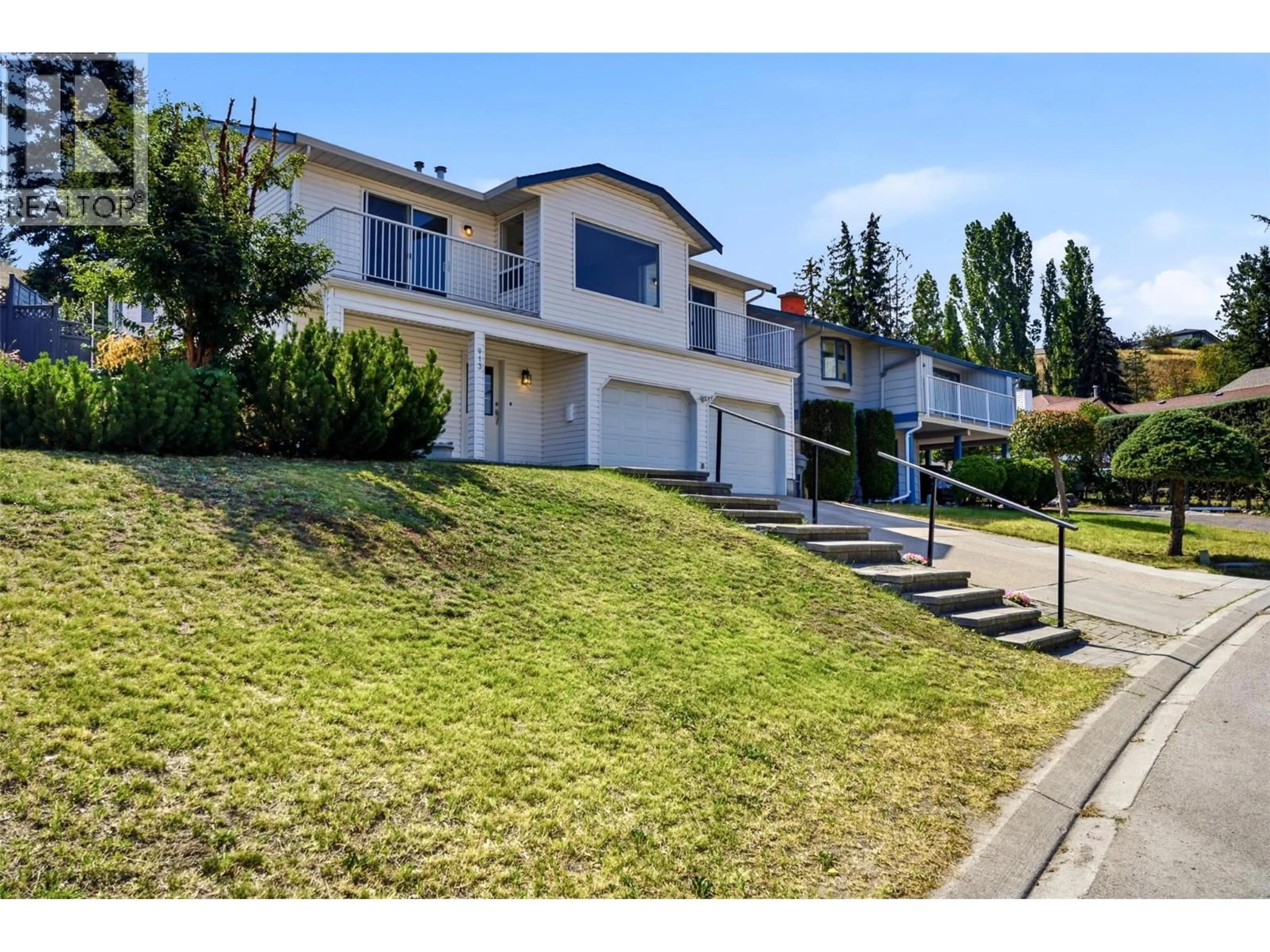 A pic from outside/outdoor area/front of a property/back of a property/a pic from drone, street for 913 GREYSTONE CRESCENT, Kamloops British Columbia V1S1K7