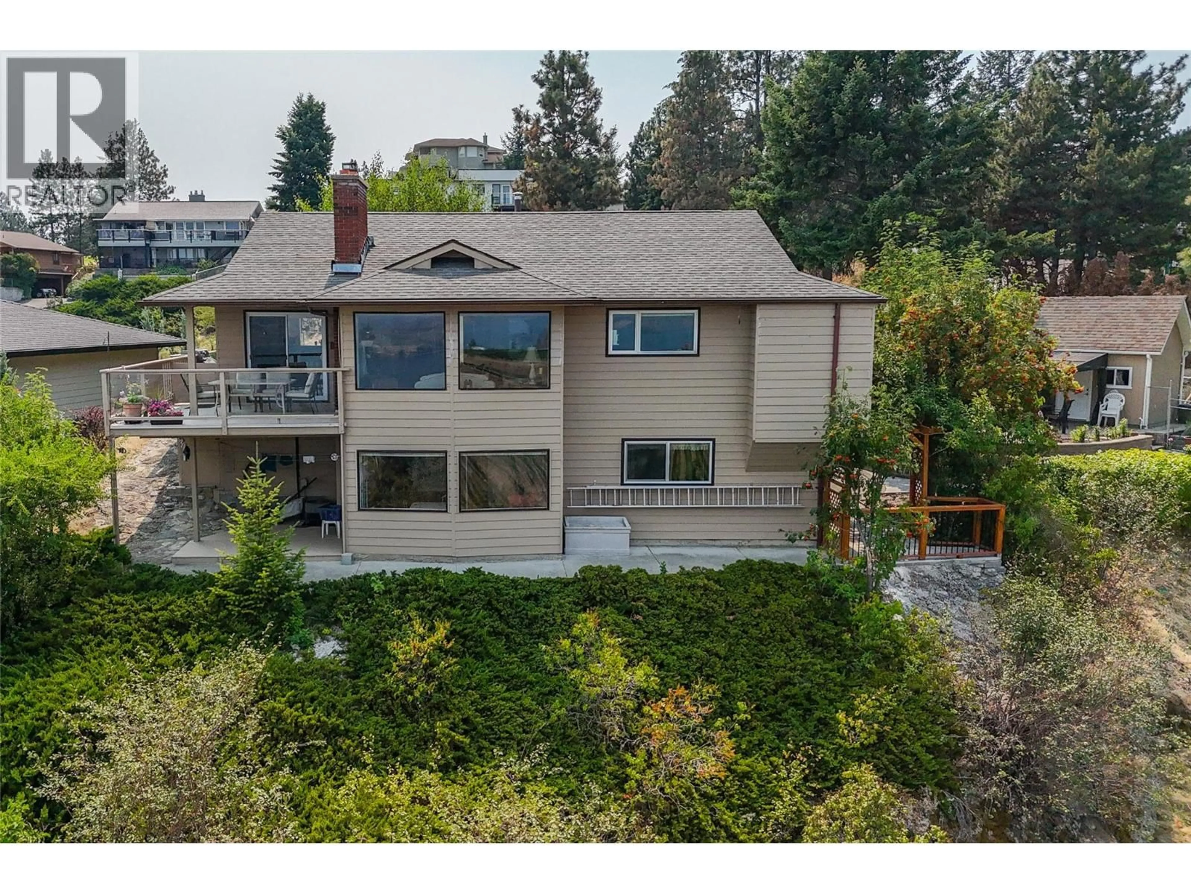 A pic from outside/outdoor area/front of a property/back of a property/a pic from drone, unknown for 129 SUMAC RIDGE DRIVE, Summerland British Columbia V0H1Z6