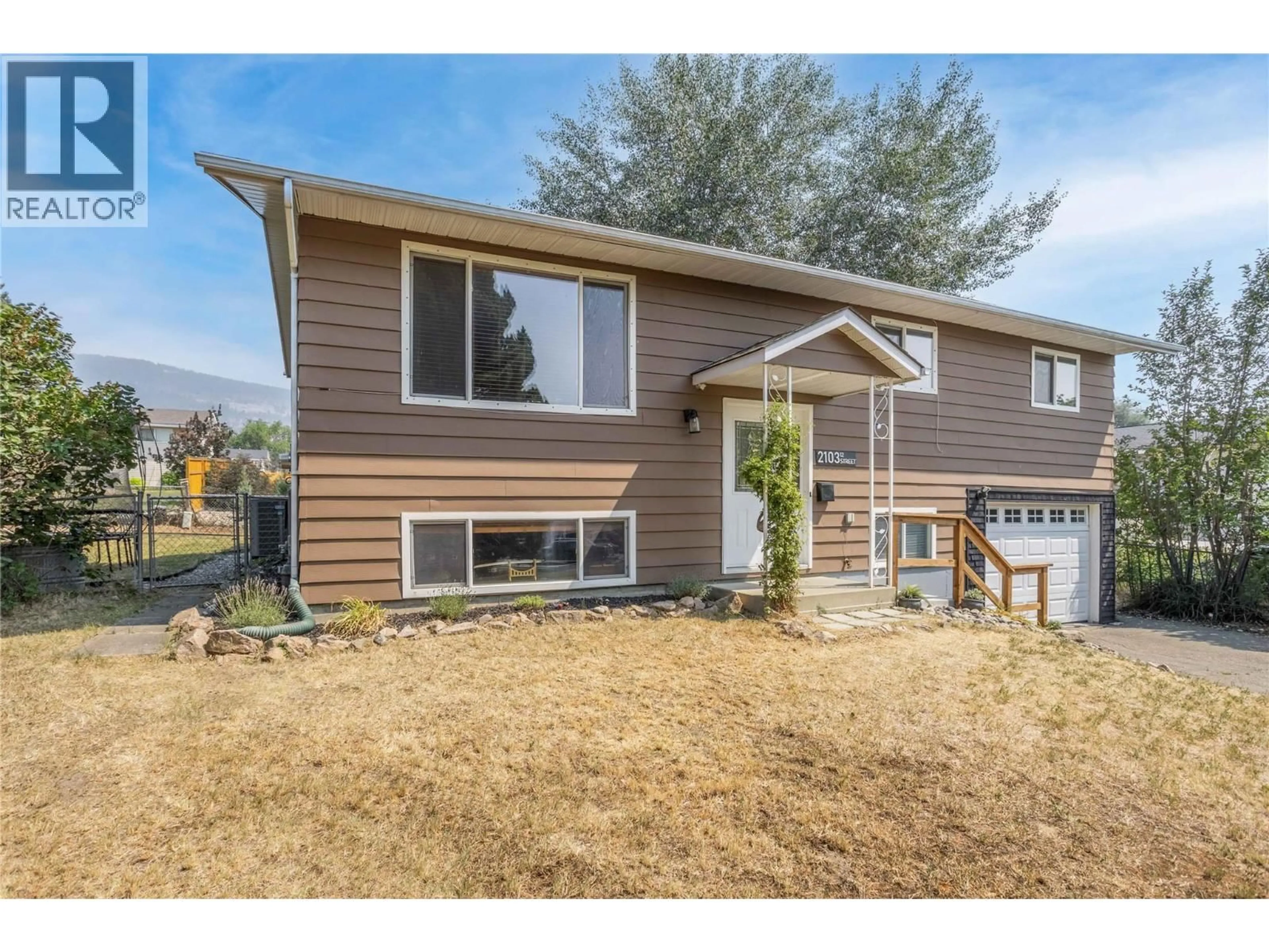 Home with vinyl exterior material, unknown for 2103 12 STREET, Vernon British Columbia V1T3S5