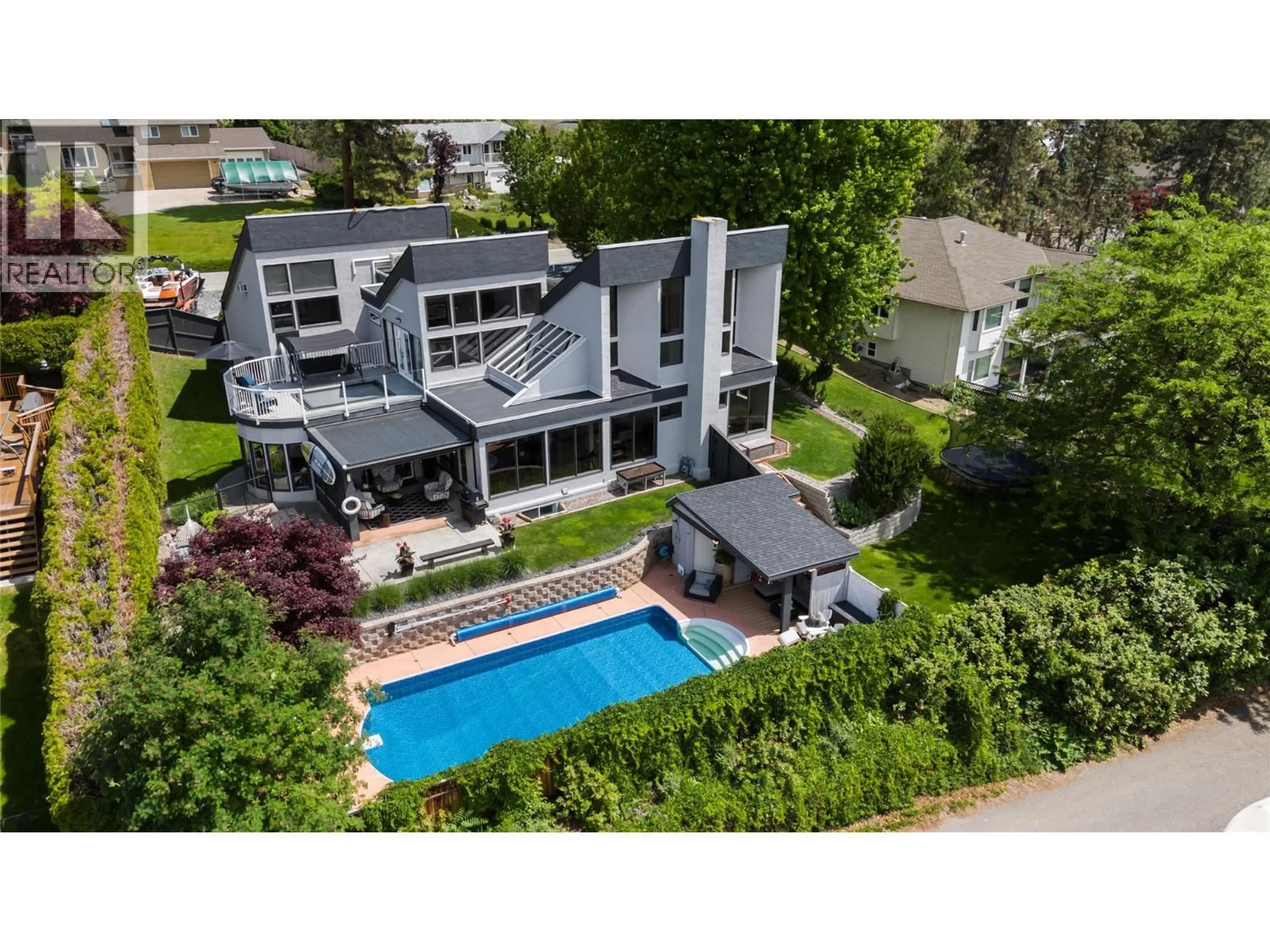 A pic from outside/outdoor area/front of a property/back of a property/a pic from drone, street for 2060 BENNETT ROAD, Kelowna British Columbia V1V2C1