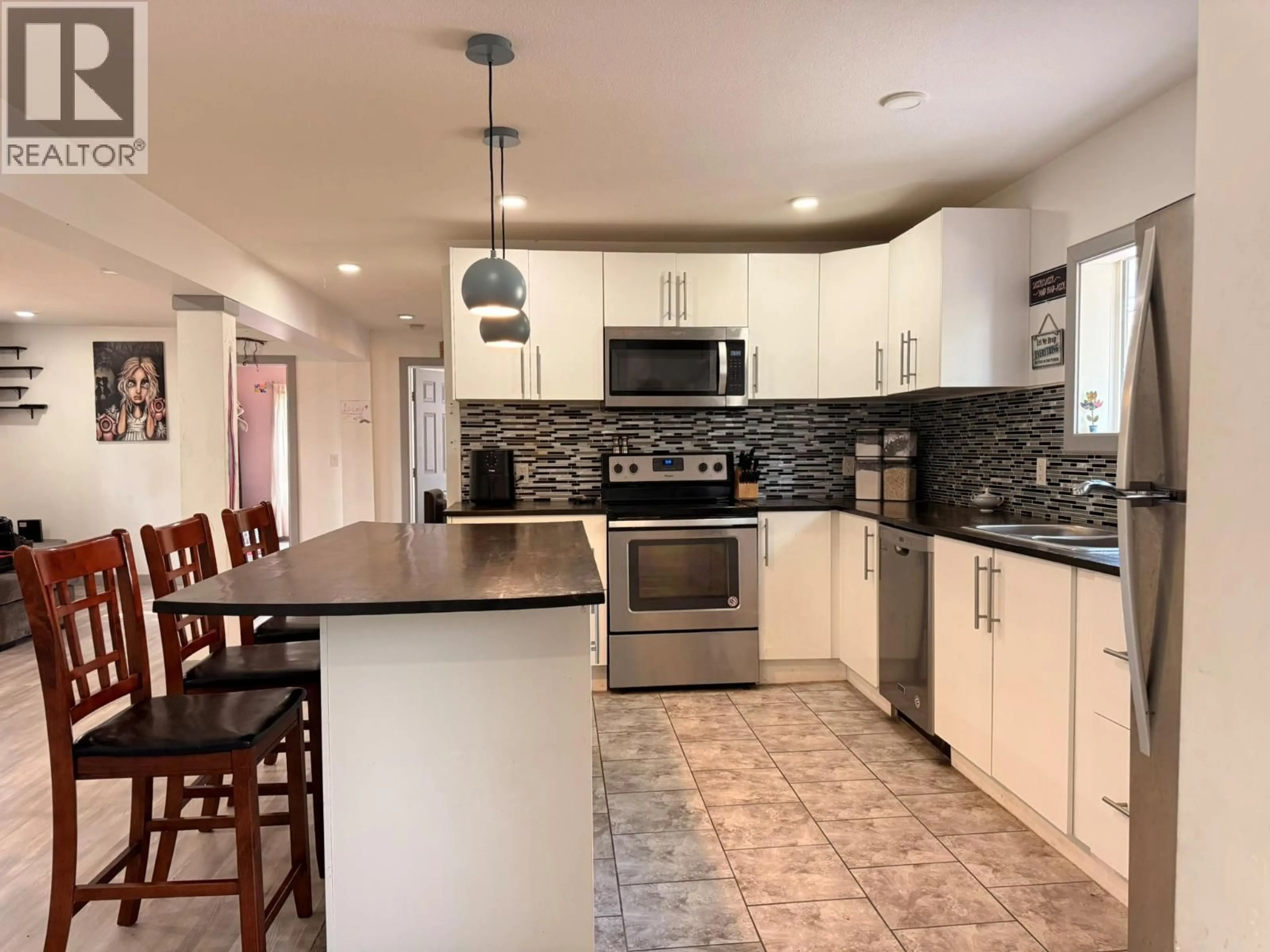 Open concept kitchen, ceramic/tile floor for 4954 STEVENS AVENUE, Canal Flats British Columbia V0B1B0