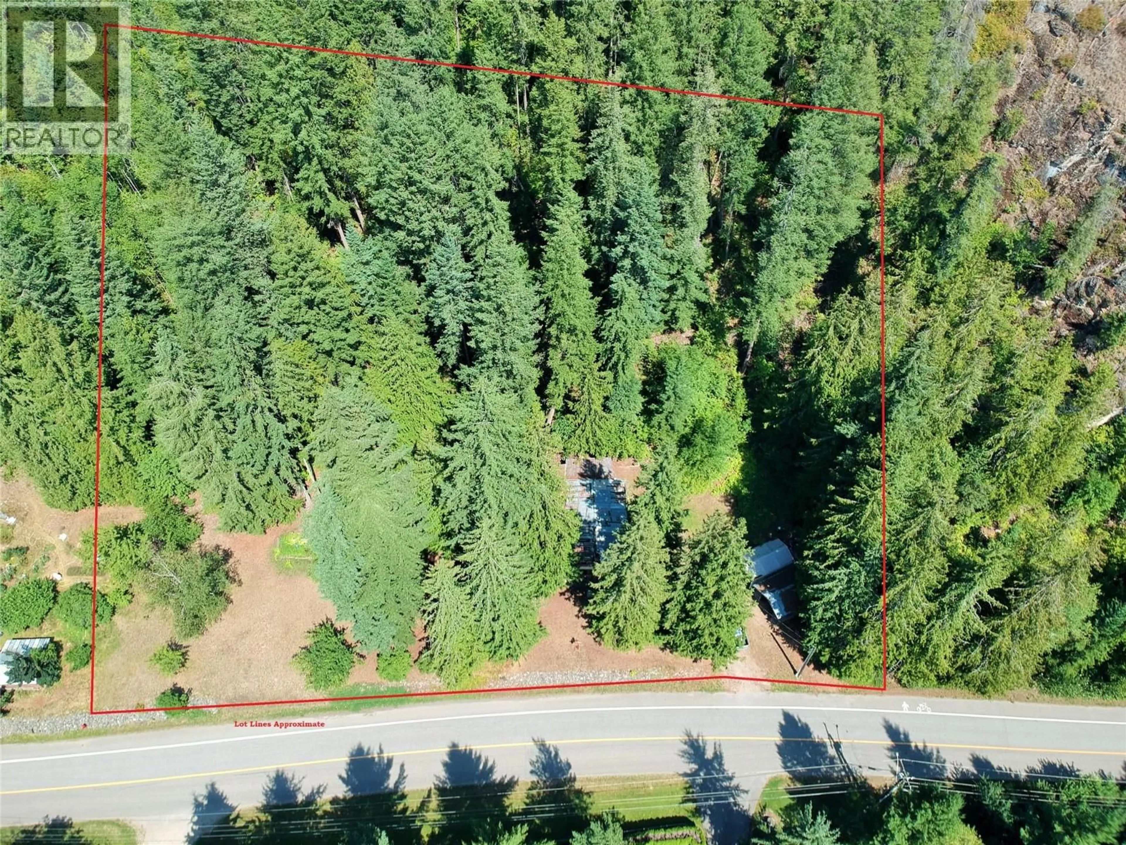 A pic from outside/outdoor area/front of a property/back of a property/a pic from drone, forest/trees view for 30 OLD TOWN ROAD, Sicamous British Columbia V0E2V1