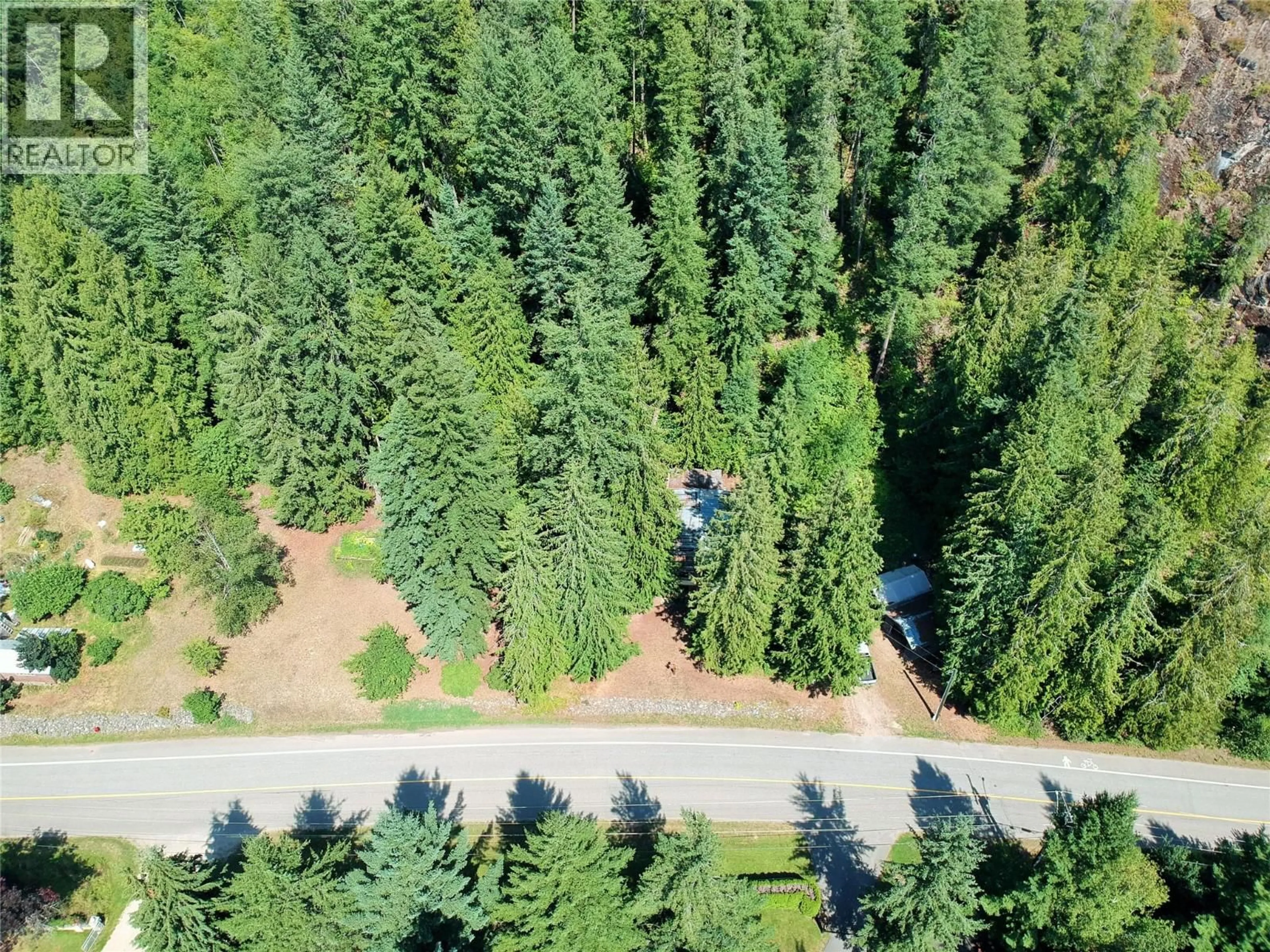 A pic from outside/outdoor area/front of a property/back of a property/a pic from drone, forest/trees view for 30 OLD TOWN ROAD, Sicamous British Columbia V0E2V1