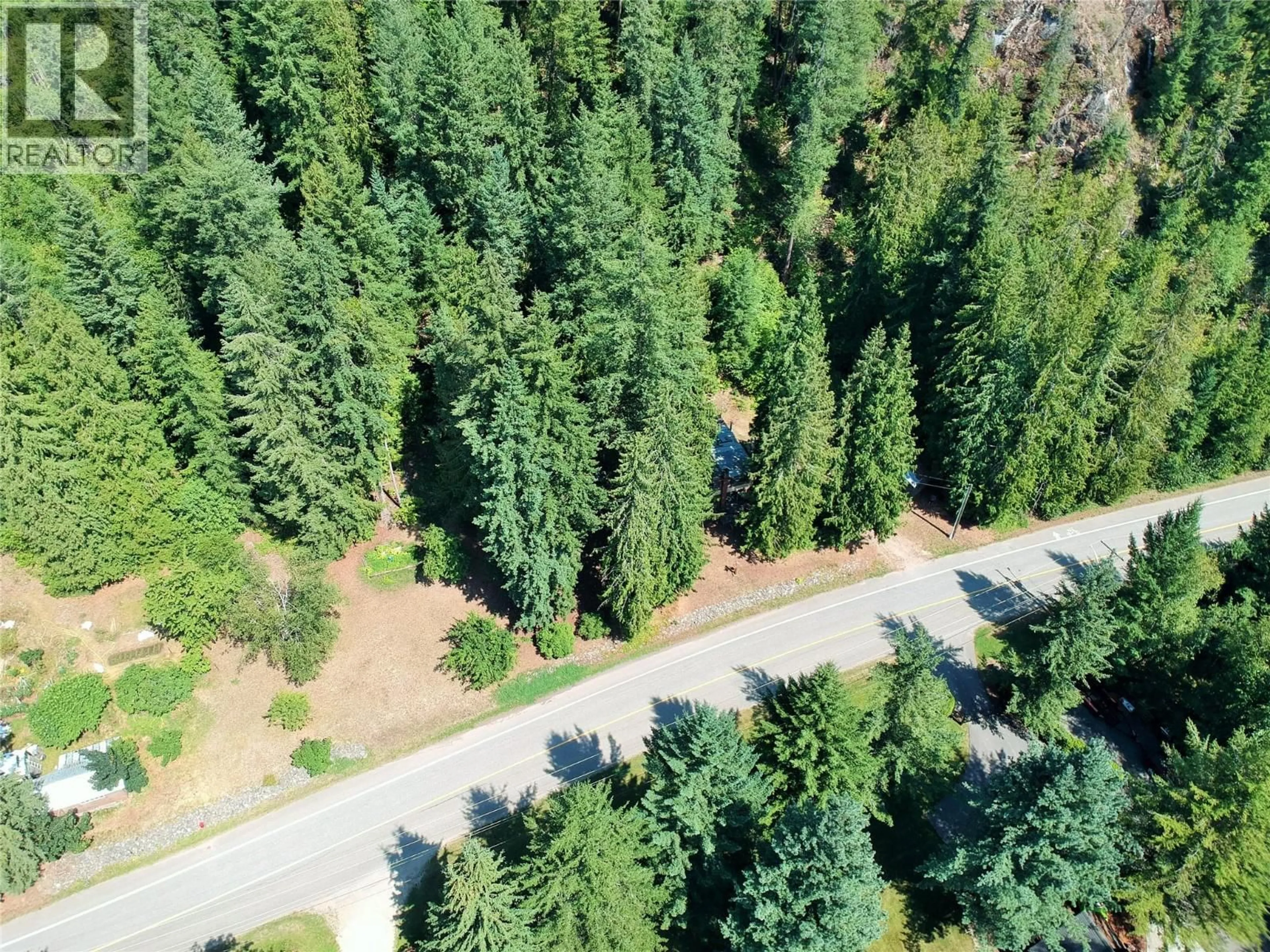 A pic from outside/outdoor area/front of a property/back of a property/a pic from drone, forest/trees view for 30 OLD TOWN ROAD, Sicamous British Columbia V0E2V1