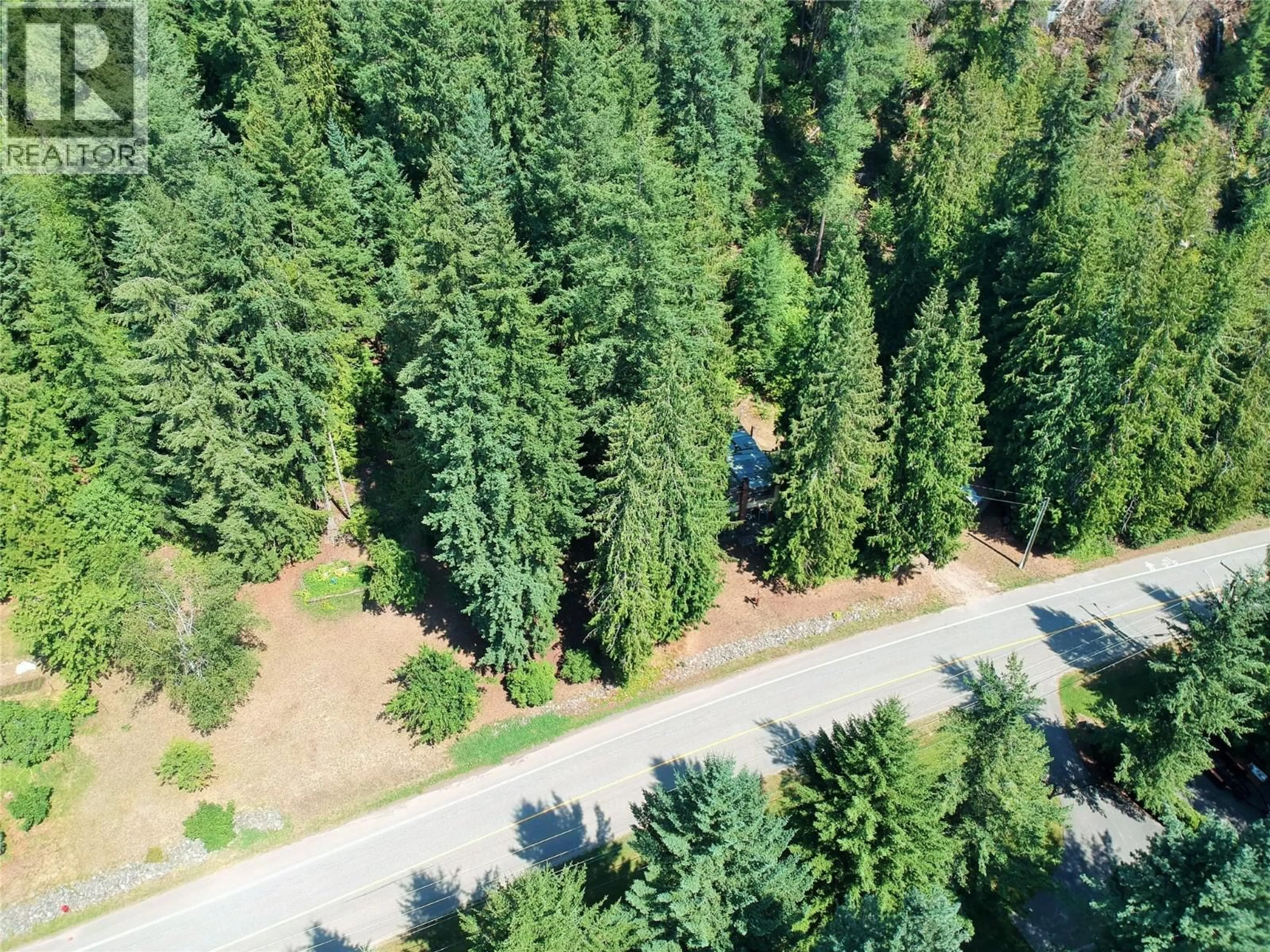A pic from outside/outdoor area/front of a property/back of a property/a pic from drone, forest/trees view for 30 OLD TOWN ROAD, Sicamous British Columbia V0E2V1