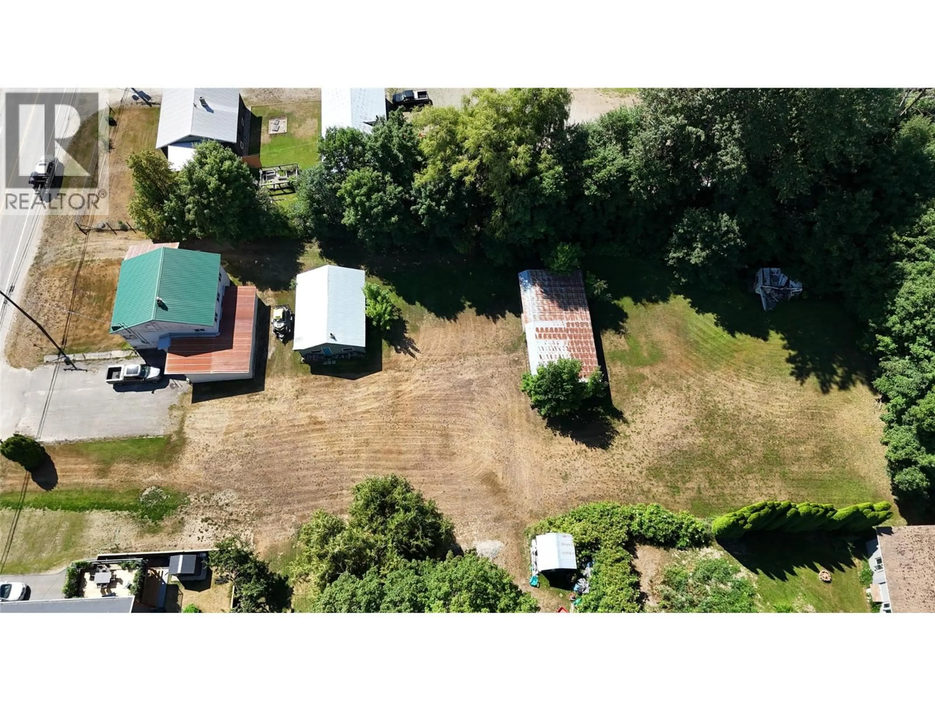 A pic from outside/outdoor area/front of a property/back of a property/a pic from drone, unknown for 719 BIG EDDY ROAD, Revelstoke British Columbia V0E2S0
