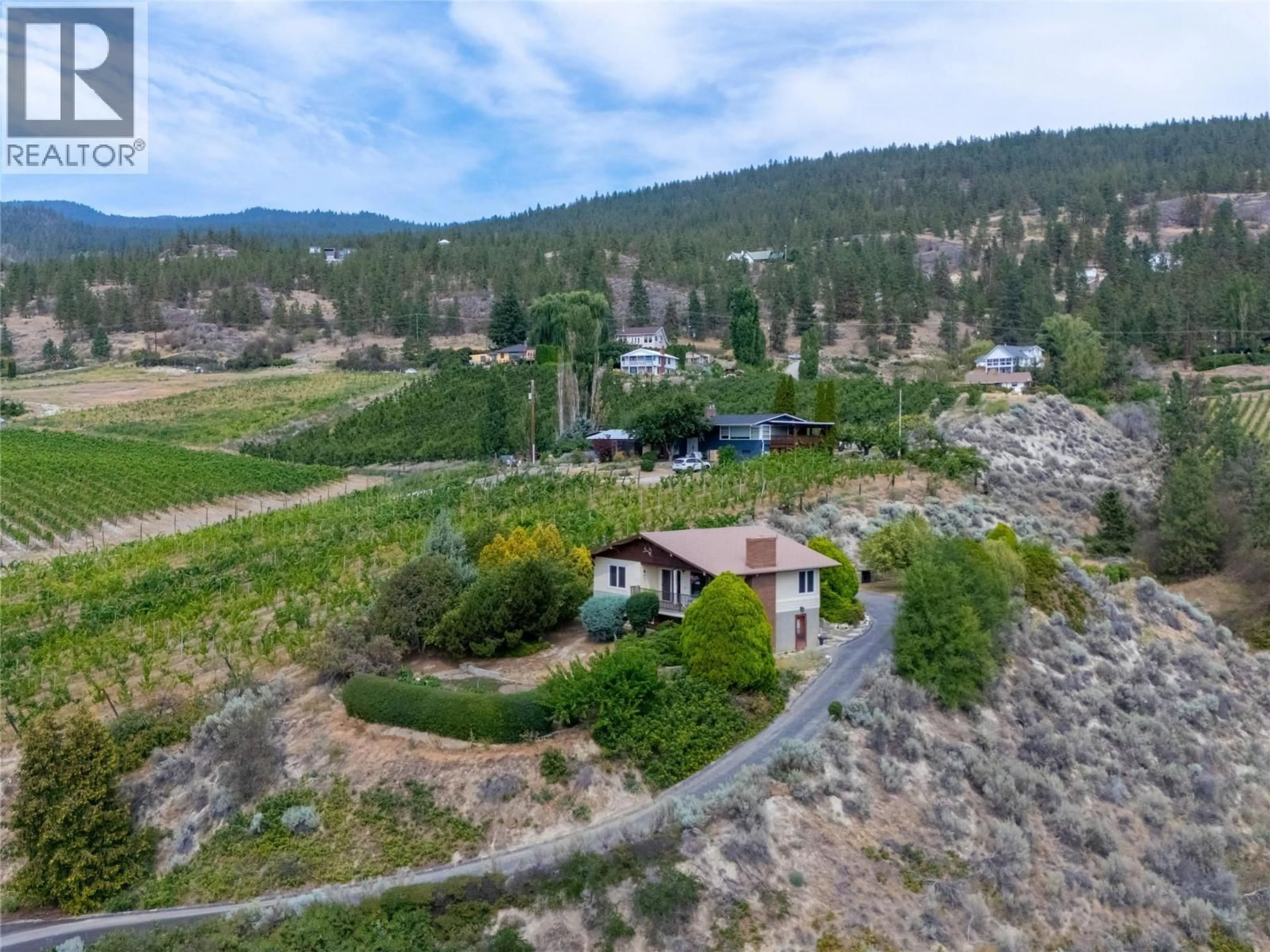 A pic from outside/outdoor area/front of a property/back of a property/a pic from drone, mountain view for 4310 GULCH ROAD, Naramata British Columbia V0H1N0