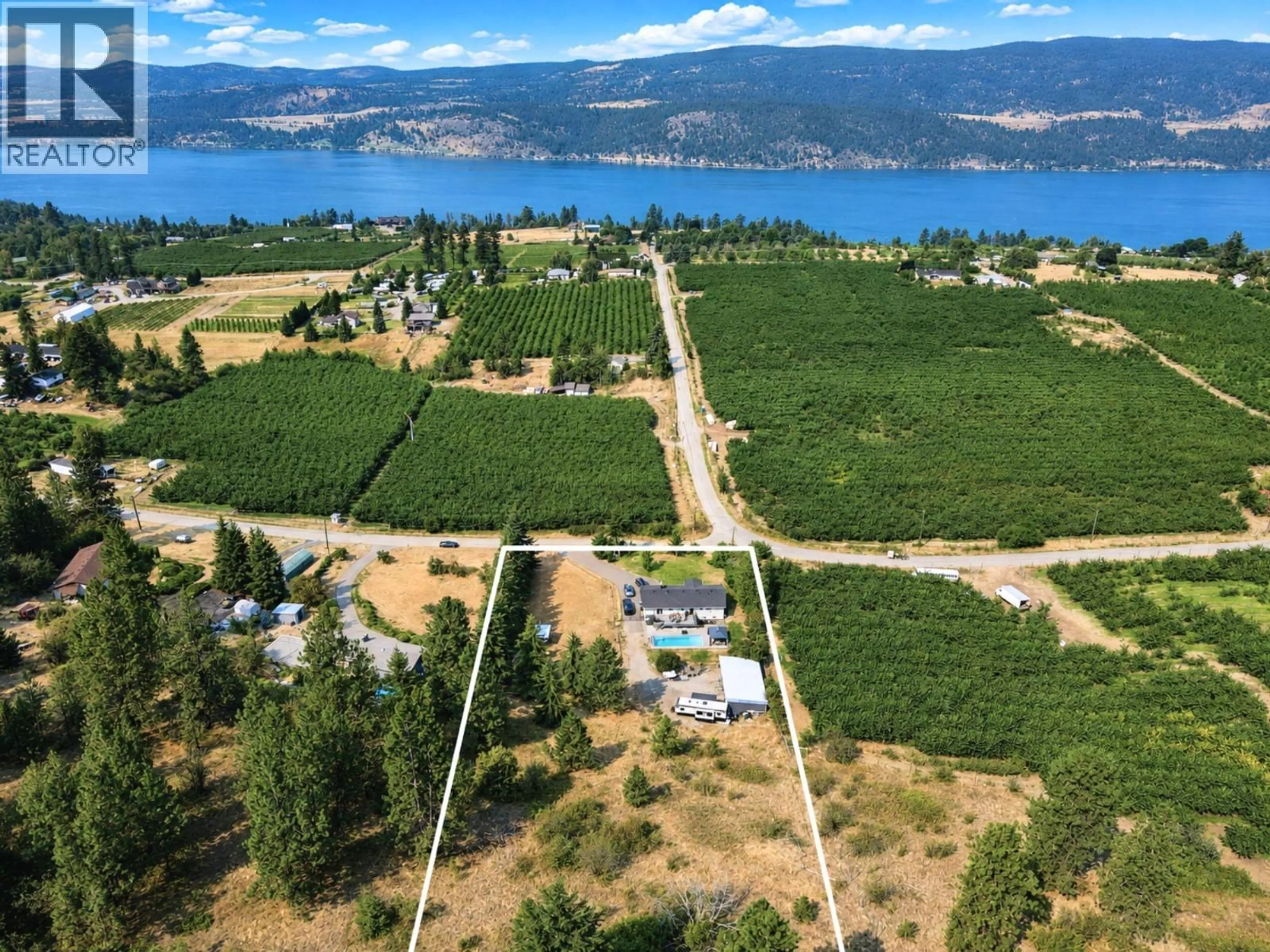 A pic from outside/outdoor area/front of a property/back of a property/a pic from drone, water/lake/river/ocean view for 13487 MIDDLE BENCH ROAD, Lake Country British Columbia V4V2B4