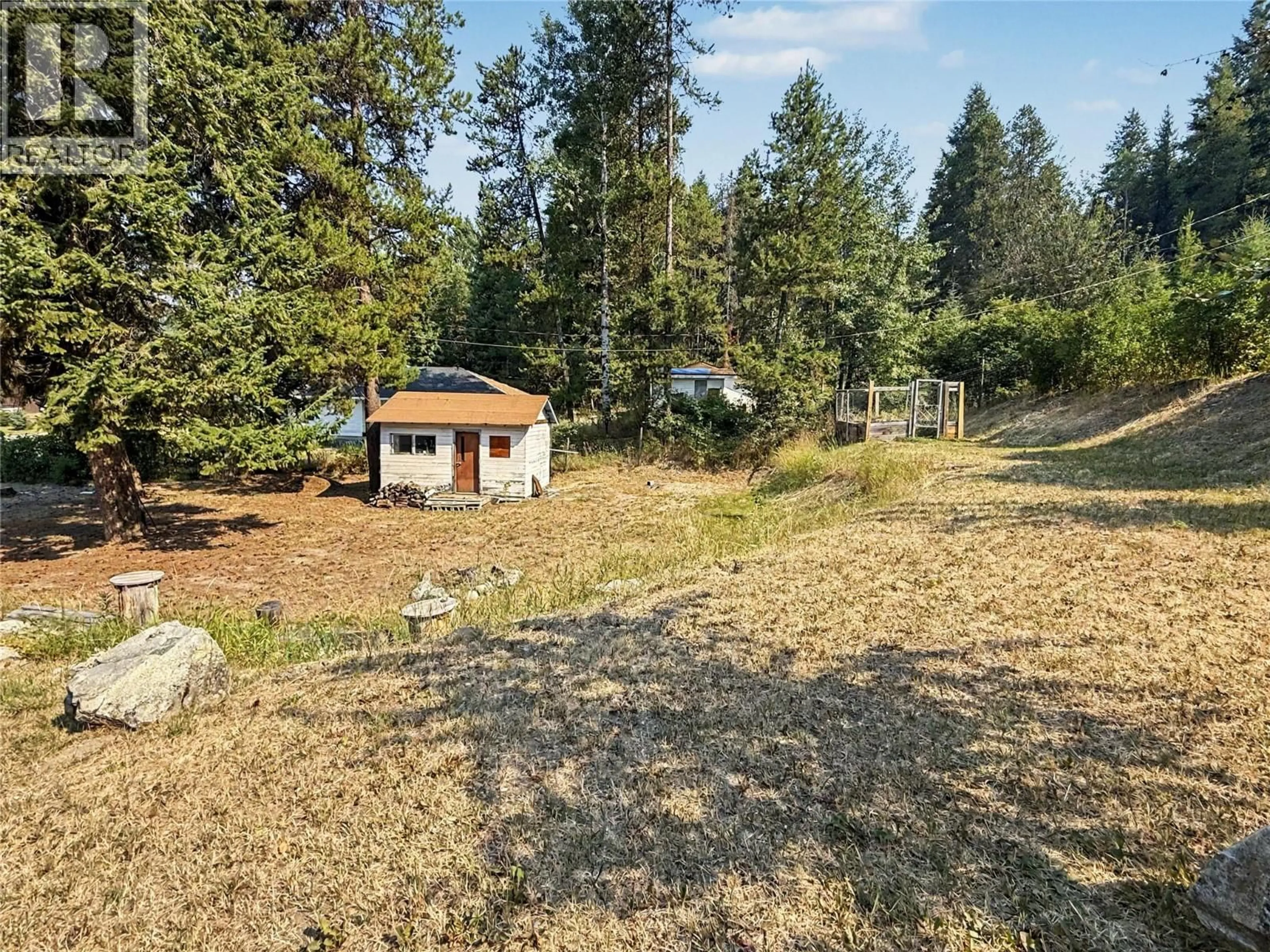 A pic from outside/outdoor area/front of a property/back of a property/a pic from drone, forest/trees view for 698 STRATHMORE AVENUE, Greenwood British Columbia V0H1J0