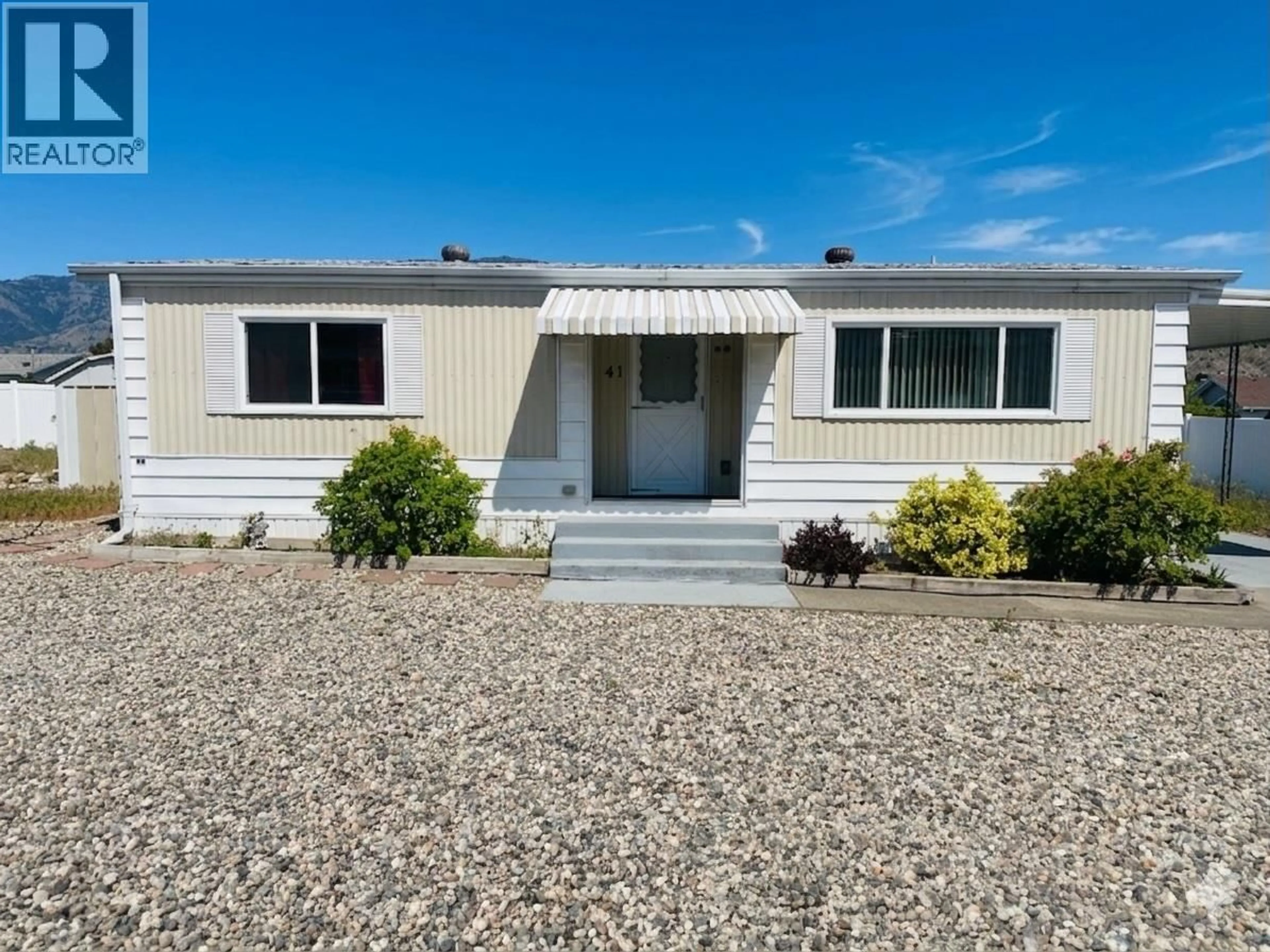 Home with vinyl exterior material, street for 41 - 6601 TUCELNUIT DRIVE, Oliver British Columbia V0H1T3
