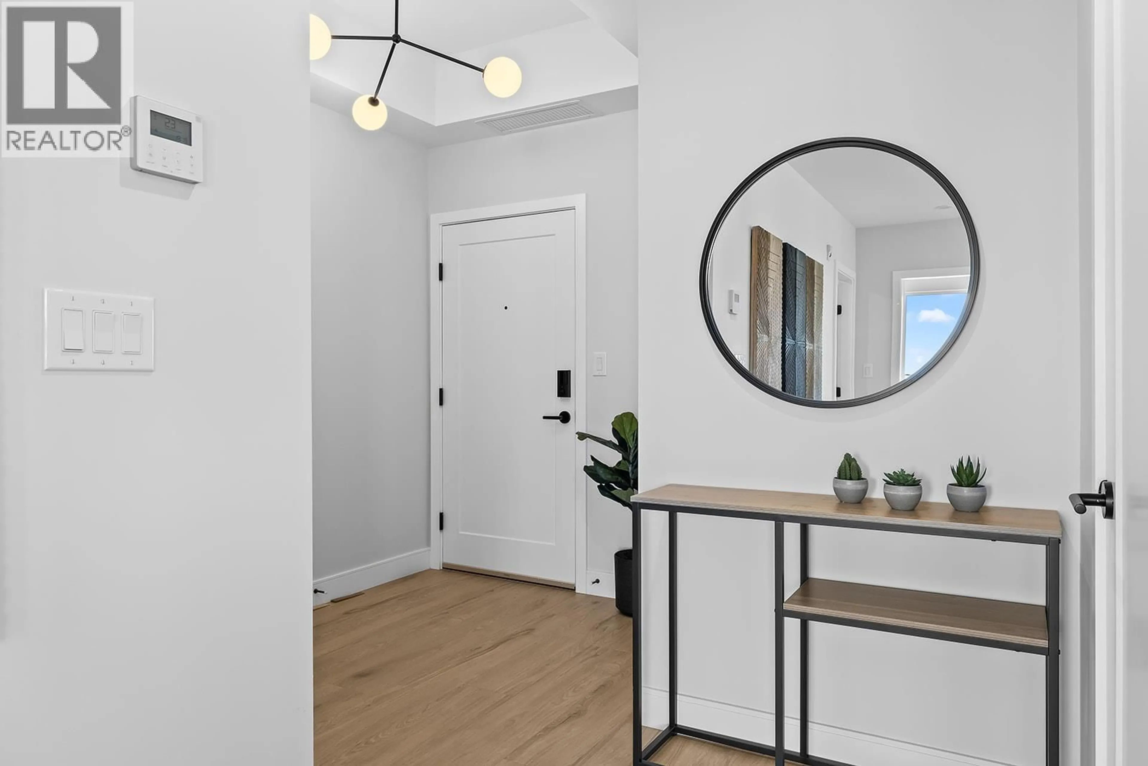 Indoor entryway for 103 - 75 PREDATOR RIDGE DRIVE, Vernon British Columbia V1H1G4