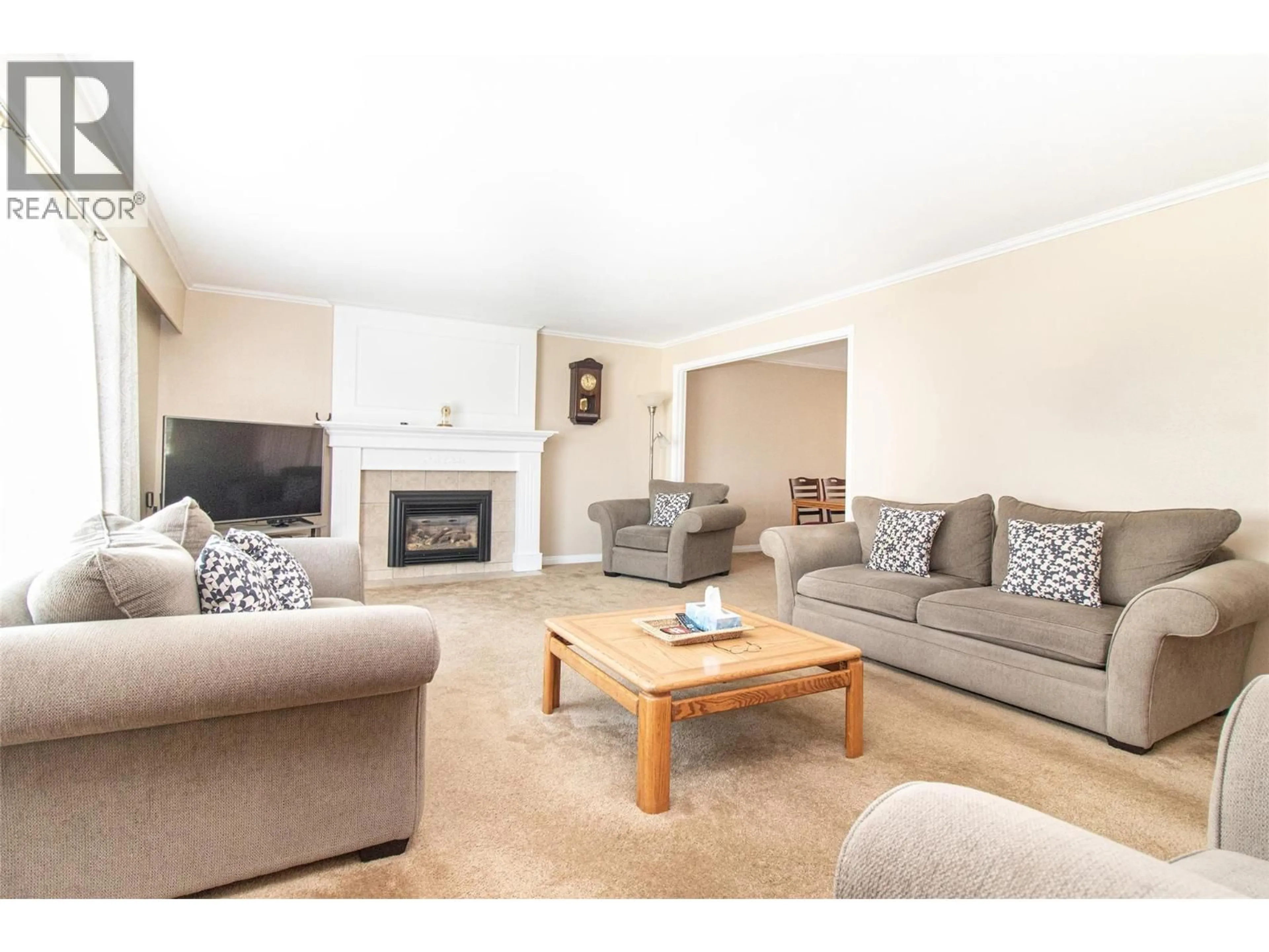 Living room with furniture, unknown for 210 WALLACE ROAD, Kelowna British Columbia V1X4T1