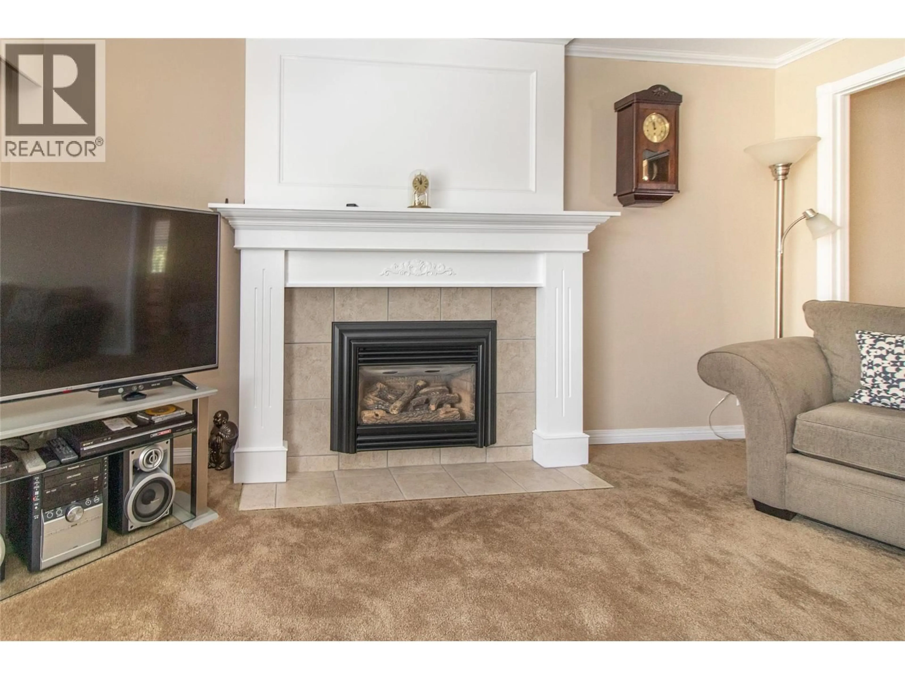 Living room with furniture, unknown for 210 WALLACE ROAD, Kelowna British Columbia V1X4T1