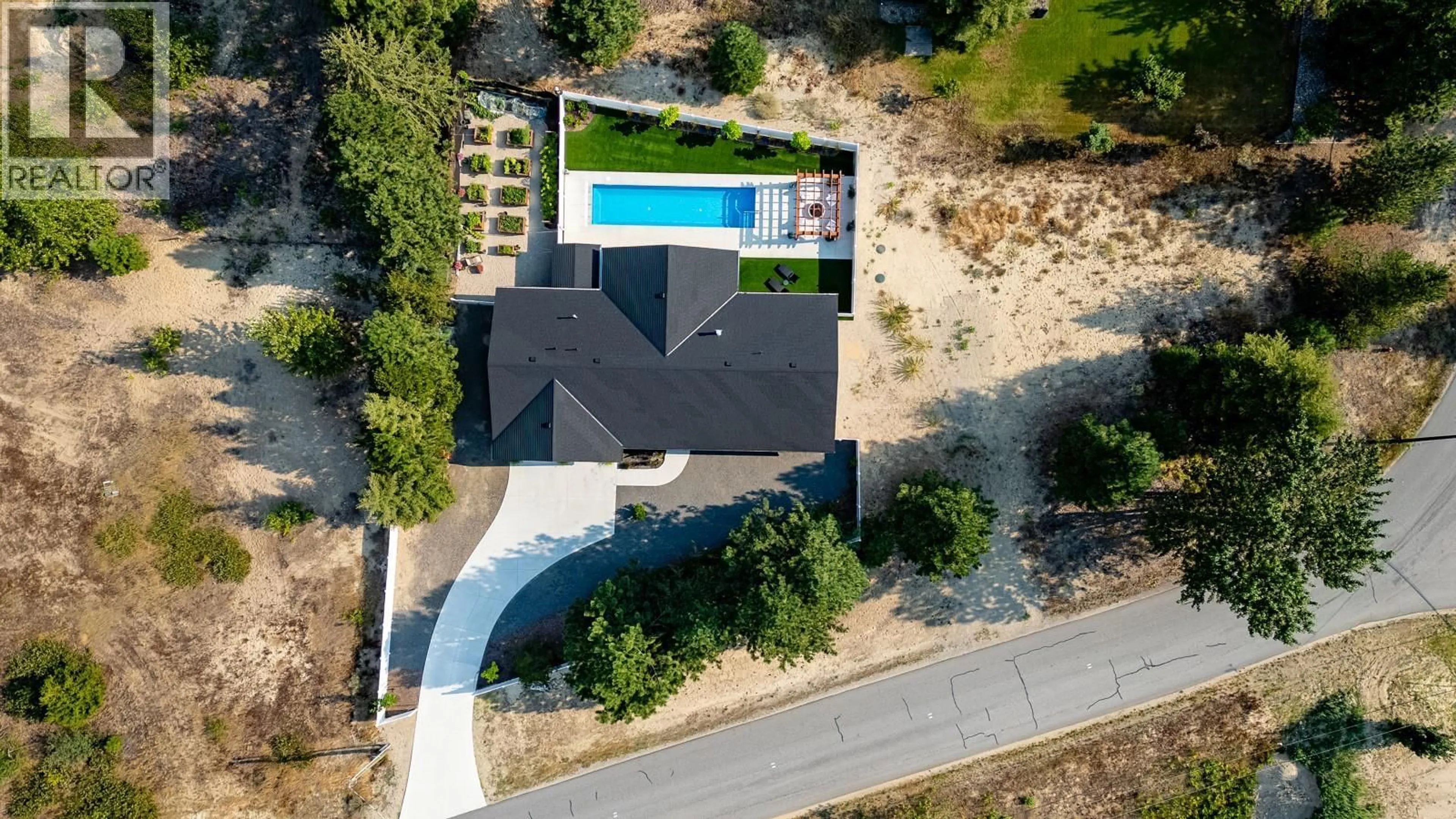 A pic from outside/outdoor area/front of a property/back of a property/a pic from drone, street for 1217 MCPHEE ROAD, Castlegar British Columbia V1N4L8