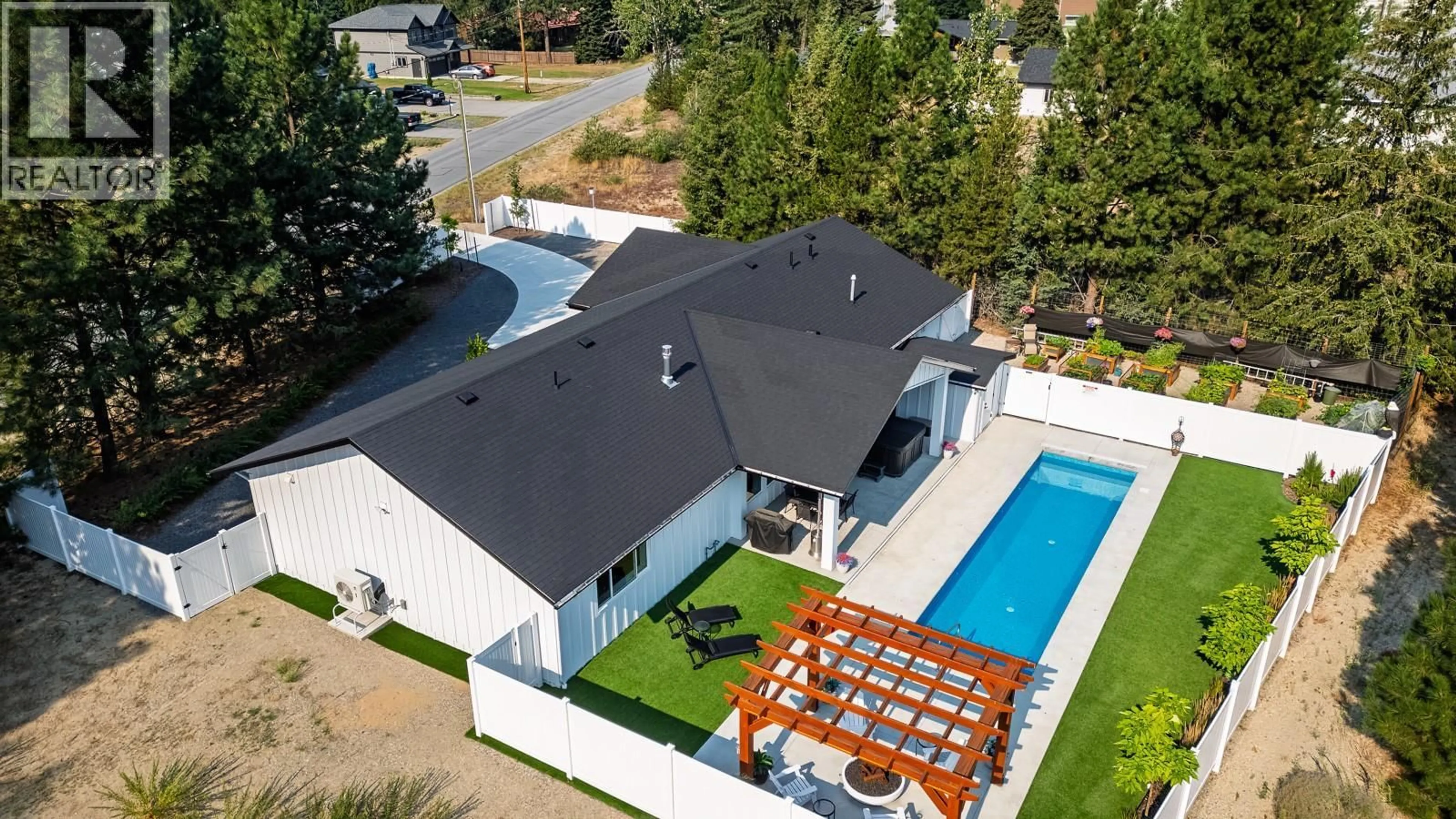 A pic from outside/outdoor area/front of a property/back of a property/a pic from drone, unknown for 1217 MCPHEE ROAD, Castlegar British Columbia V1N4L8