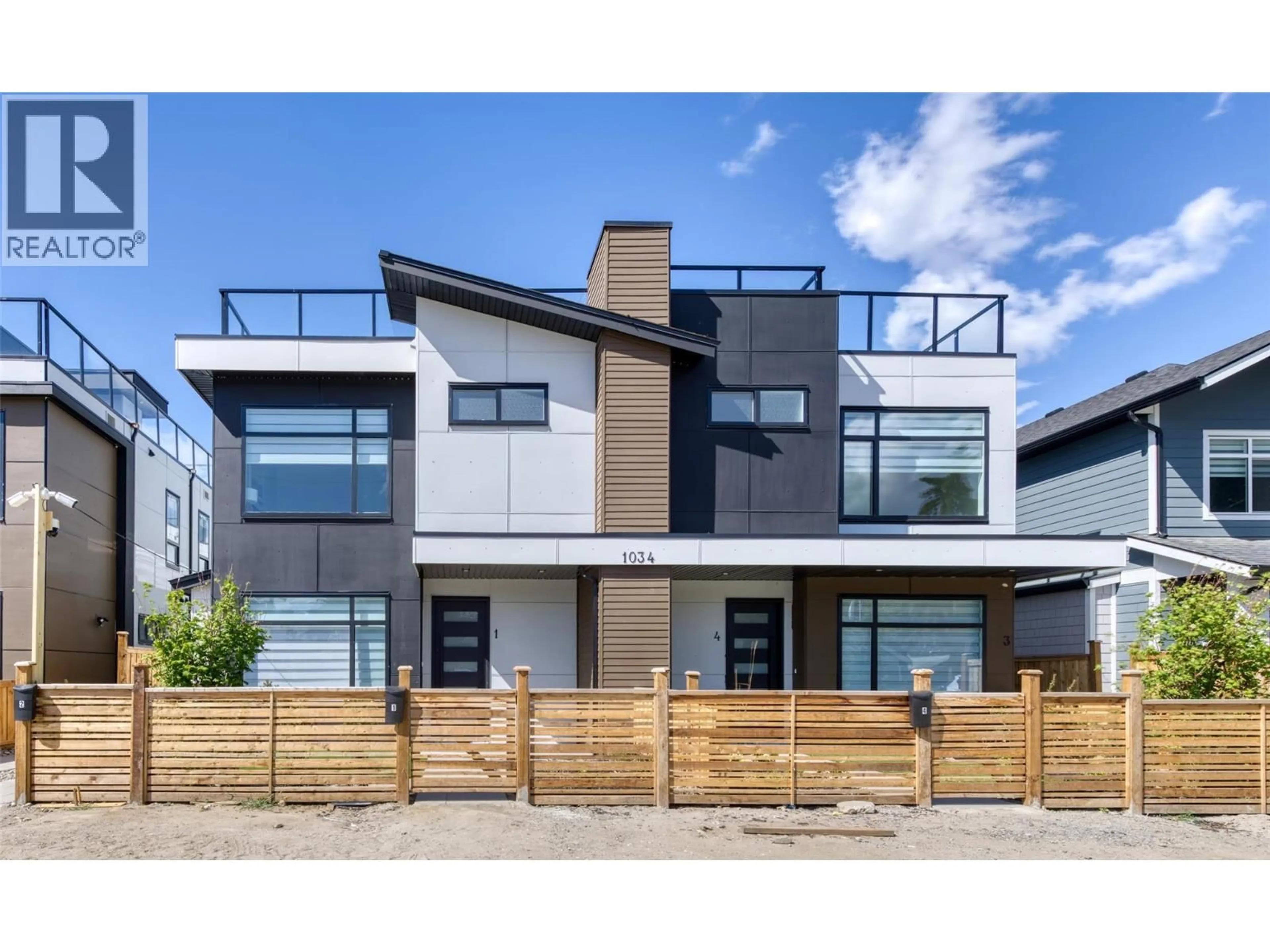 Home with brick exterior material, street for 1 - 1034 MARTIN AVENUE, Kelowna British Columbia V1Y6V5