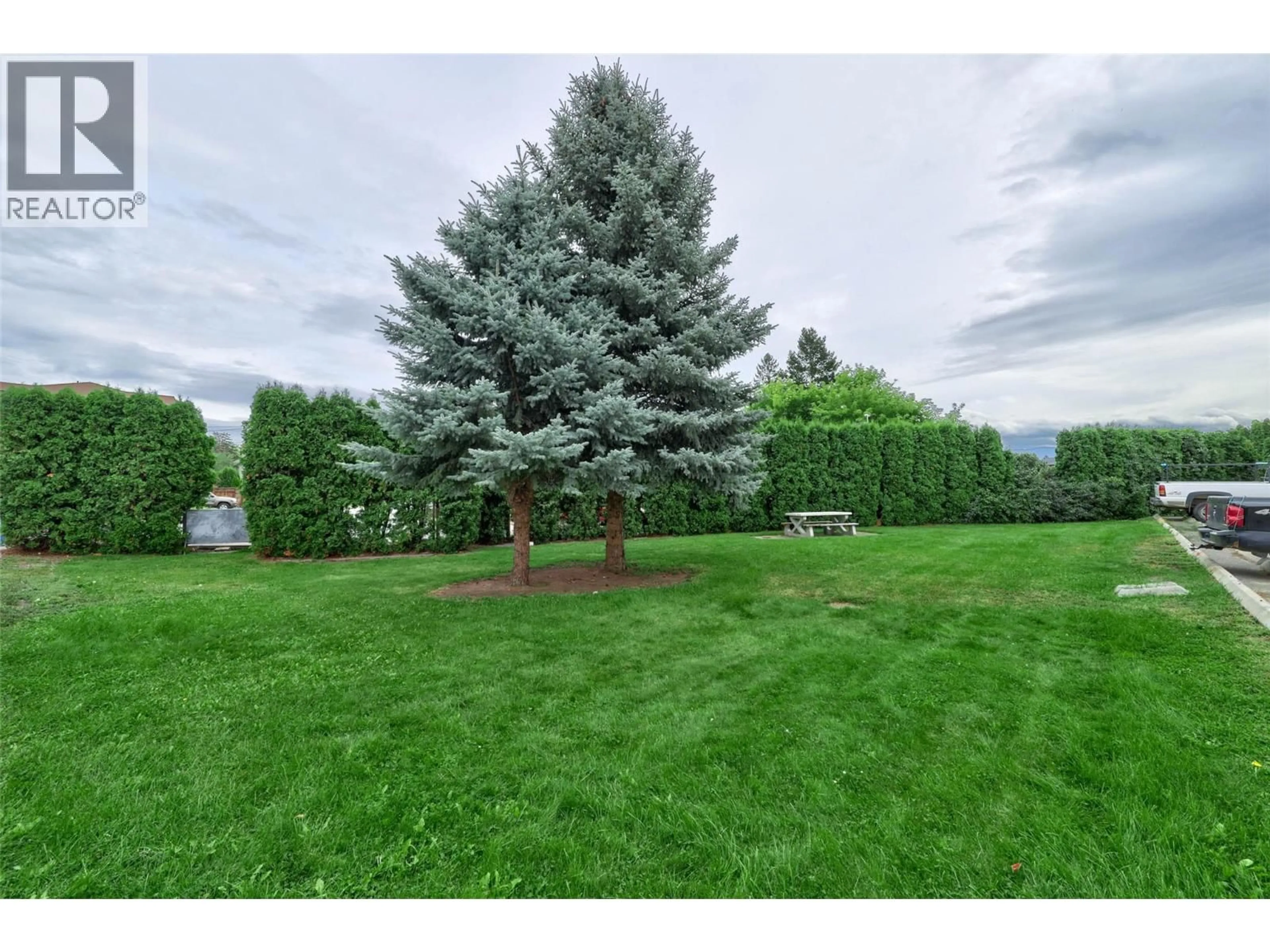 A pic from outside/outdoor area/front of a property/back of a property/a pic from drone, forest/trees view for 218 - 1760 BRUNNER AVENUE, Kamloops British Columbia V2B3L7